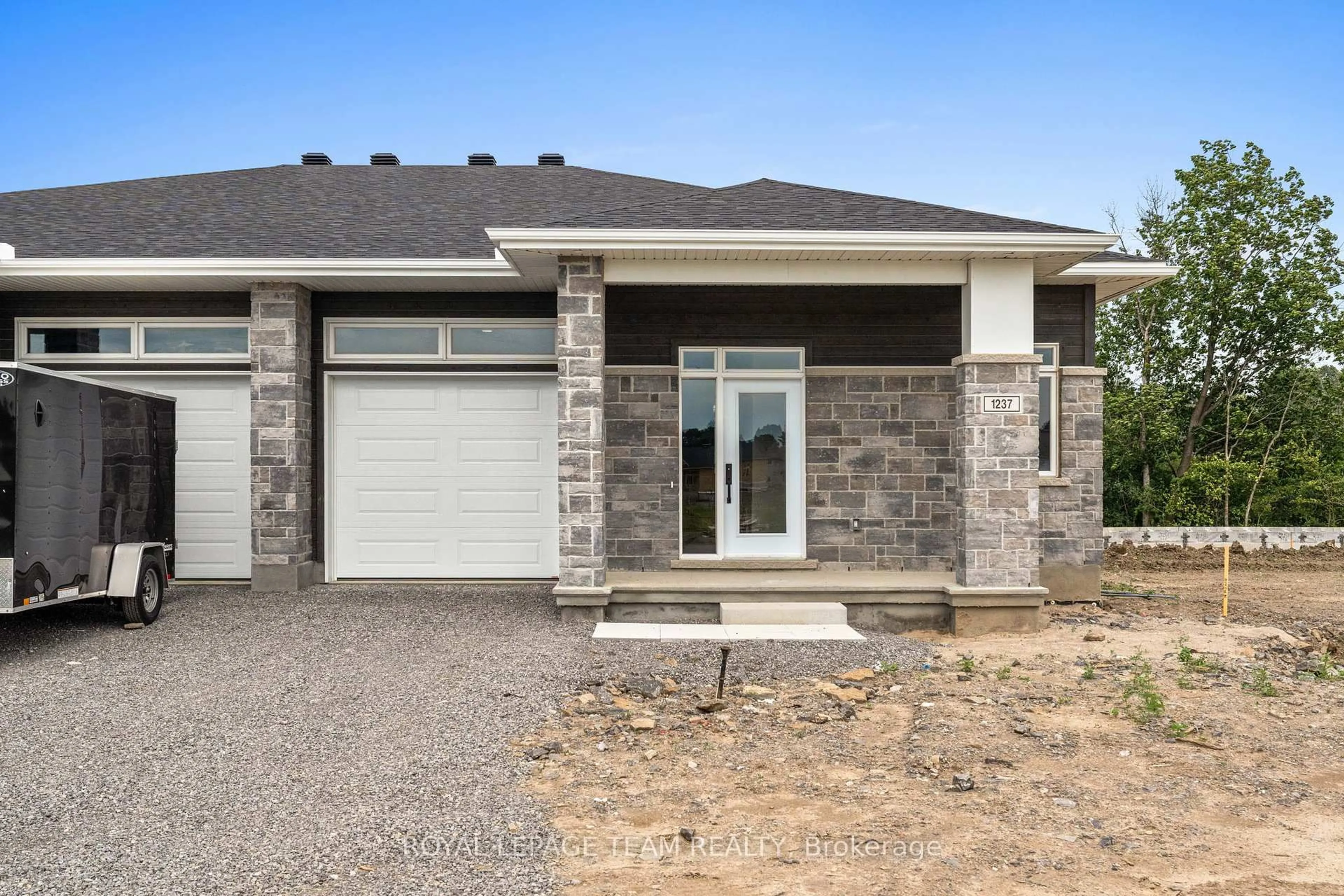 Home with brick exterior material, street for 1039 Moore St, Brockville Ontario K6V 7N1