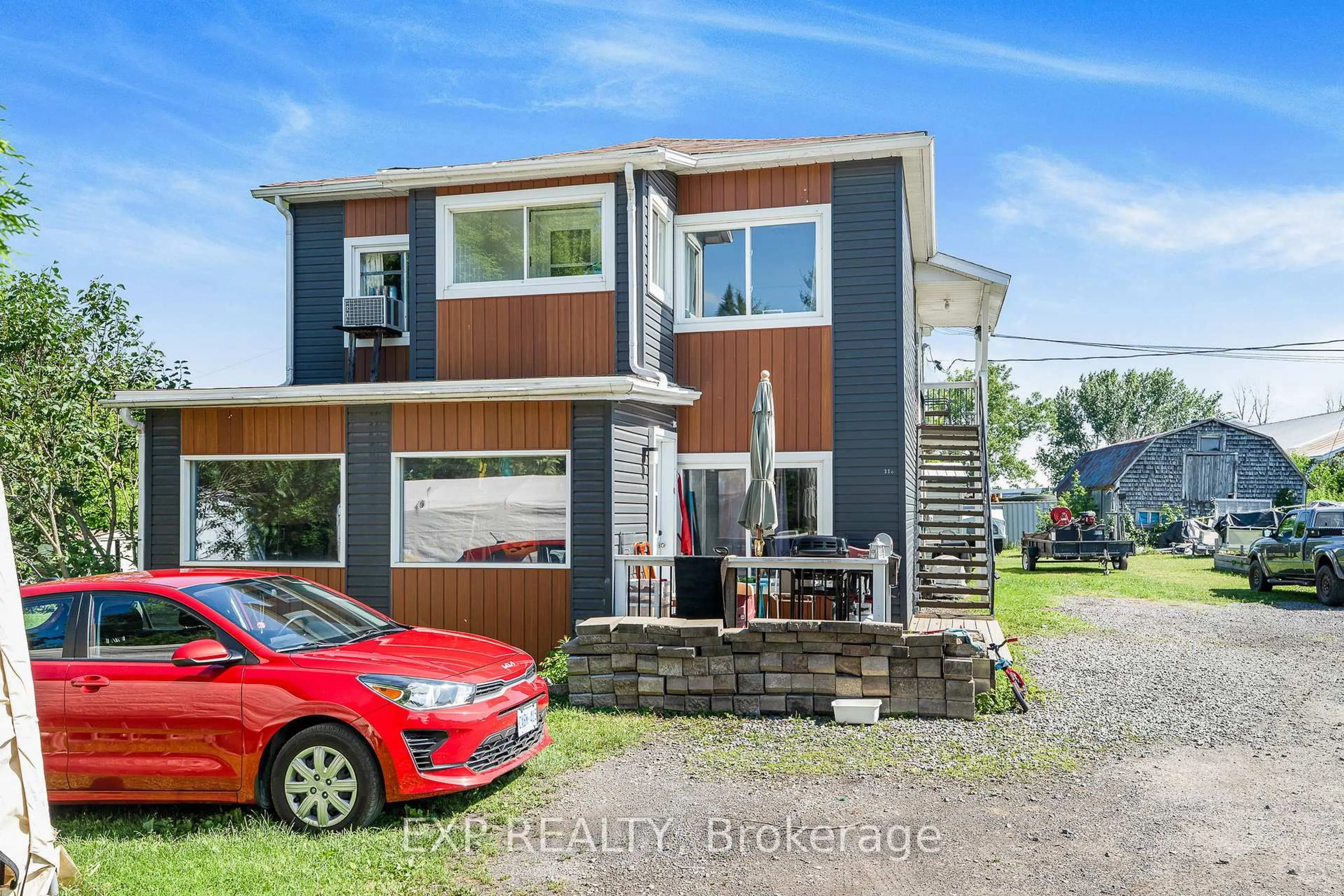 Home with brick exterior material, street for 309-313 Front Rd, Hawkesbury Ontario K6A 2T1