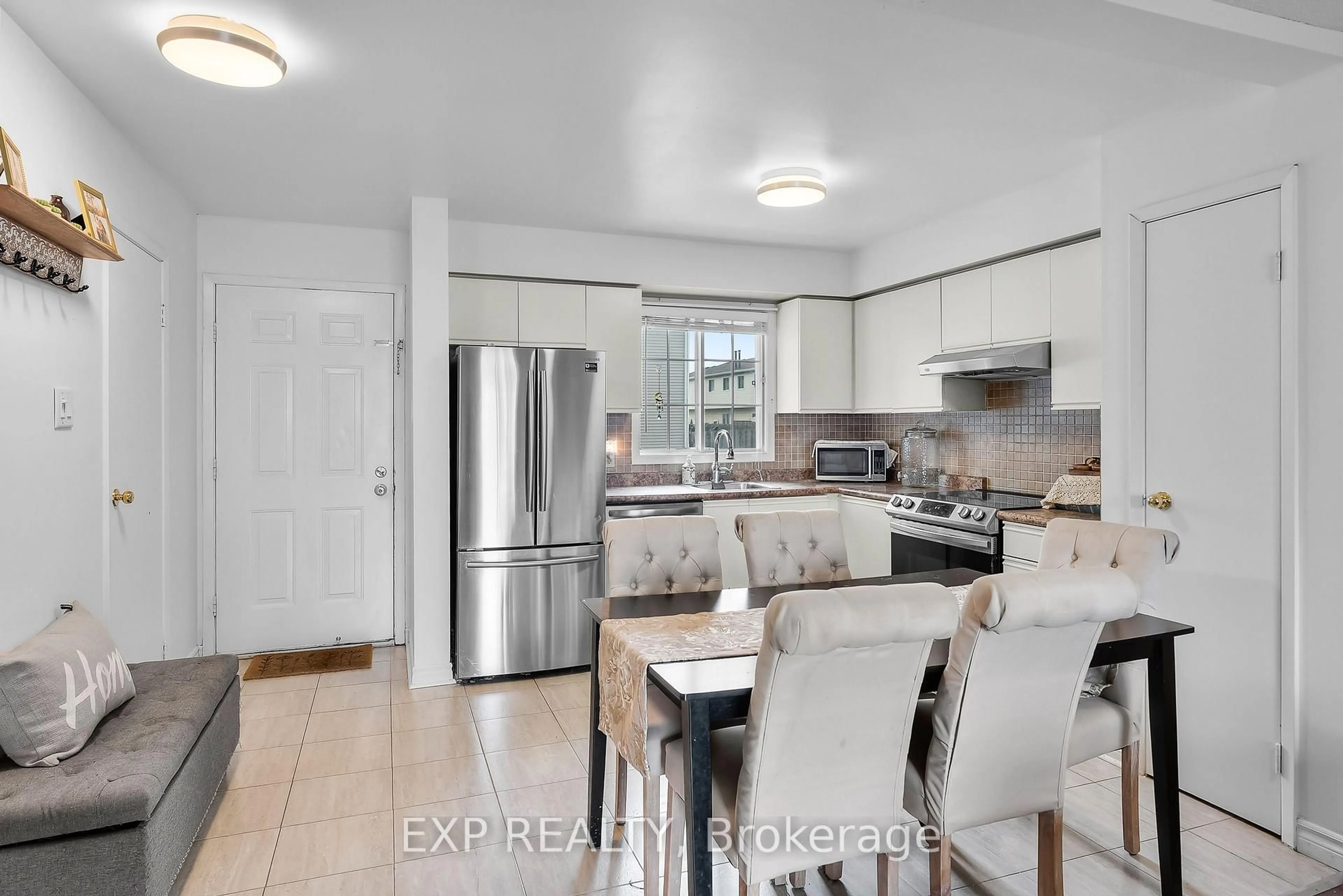 Open concept kitchen, ceramic/tile floor for 8141 Coventry Rd #84, Niagara Falls Ontario L2H 2X7
