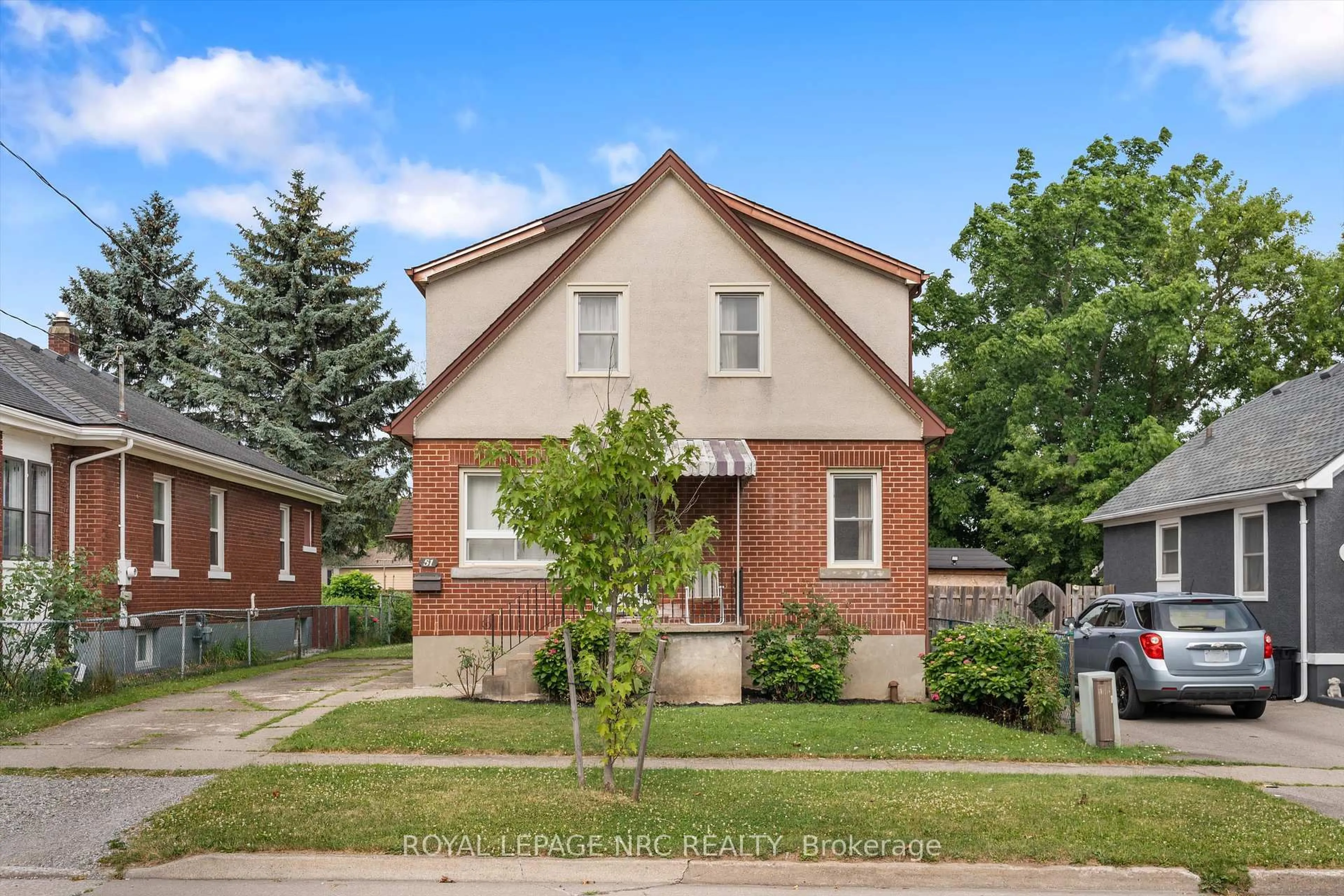 Home with brick exterior material, street for 51 Currie St, St. Catharines Ontario L2M 5M9
