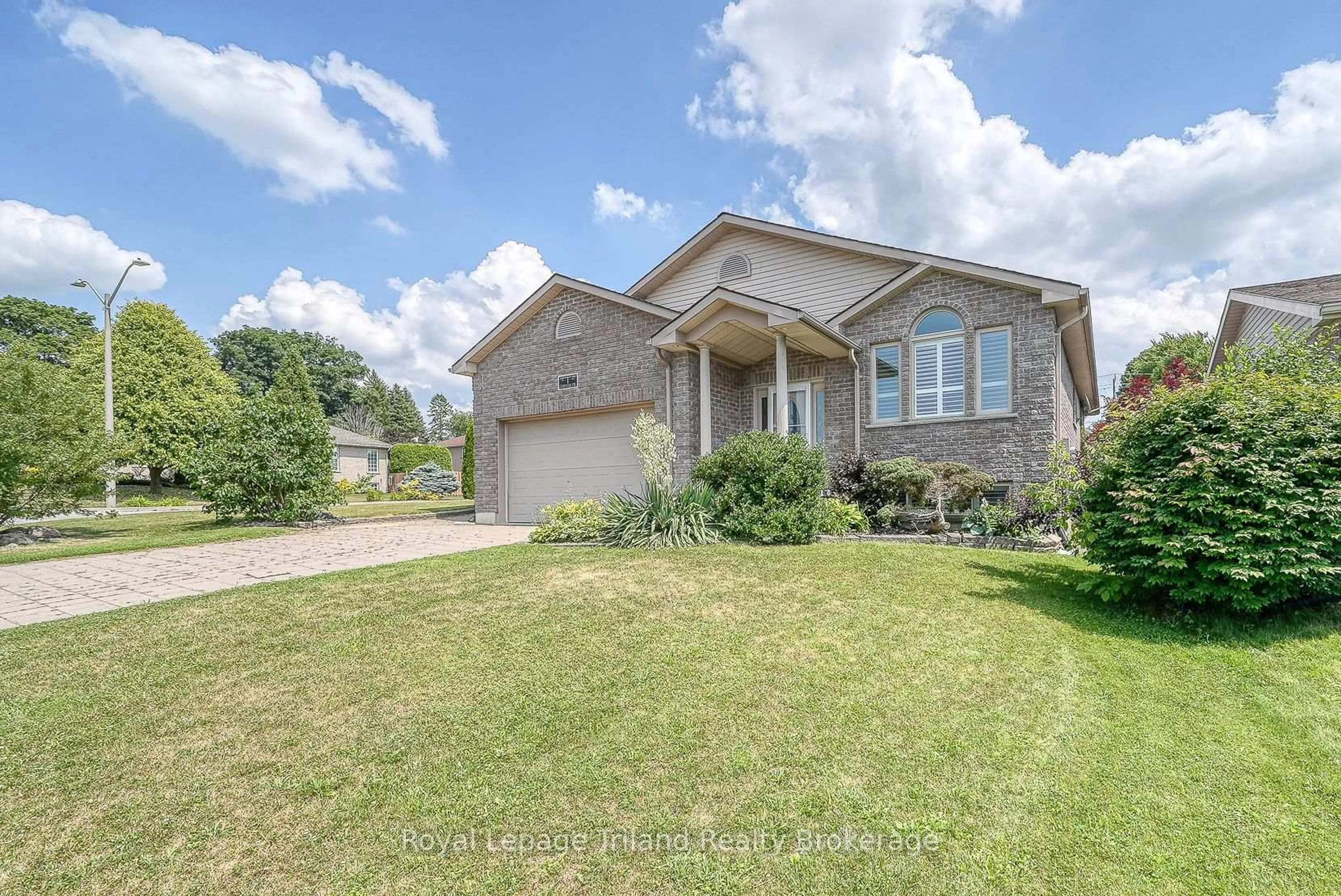 Home with brick exterior material, street for 1 Cornish Cres, Ingersoll Ontario N5C 4C9