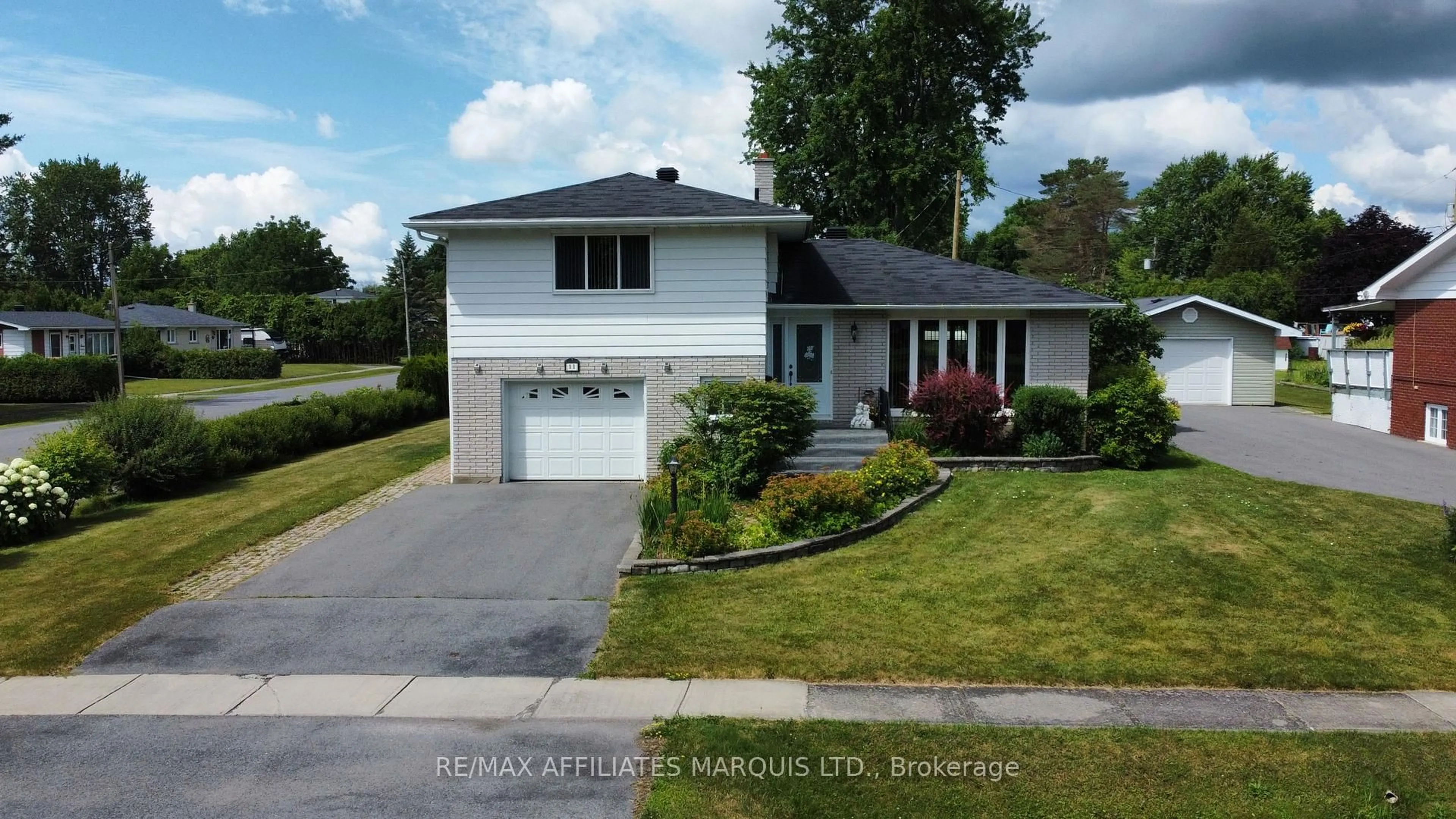 Home with vinyl exterior material, street for 11 Ault Dr, South Stormont Ontario K0C 1M0