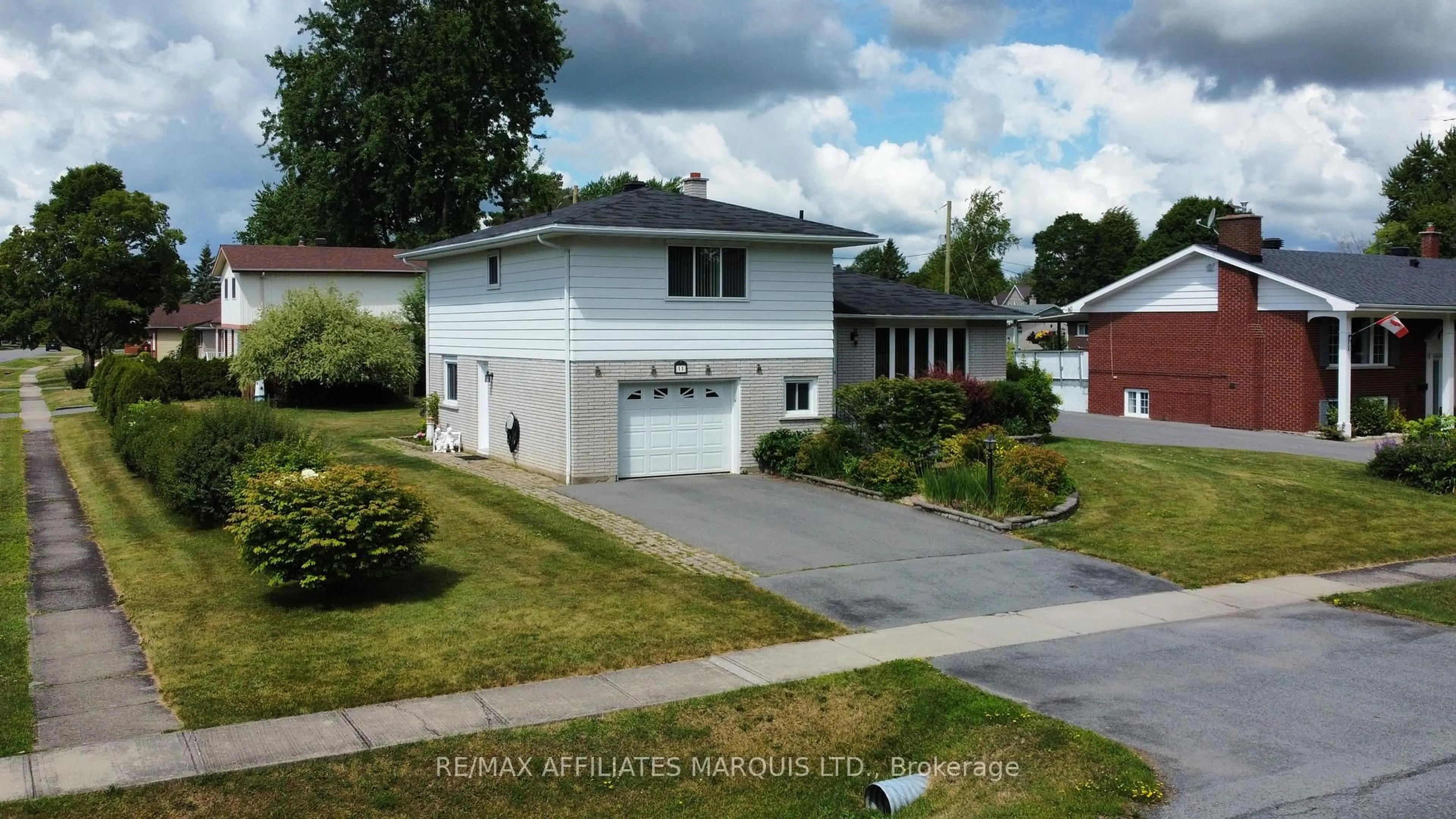 Home with vinyl exterior material, street for 11 Ault Dr, South Stormont Ontario K0C 1M0