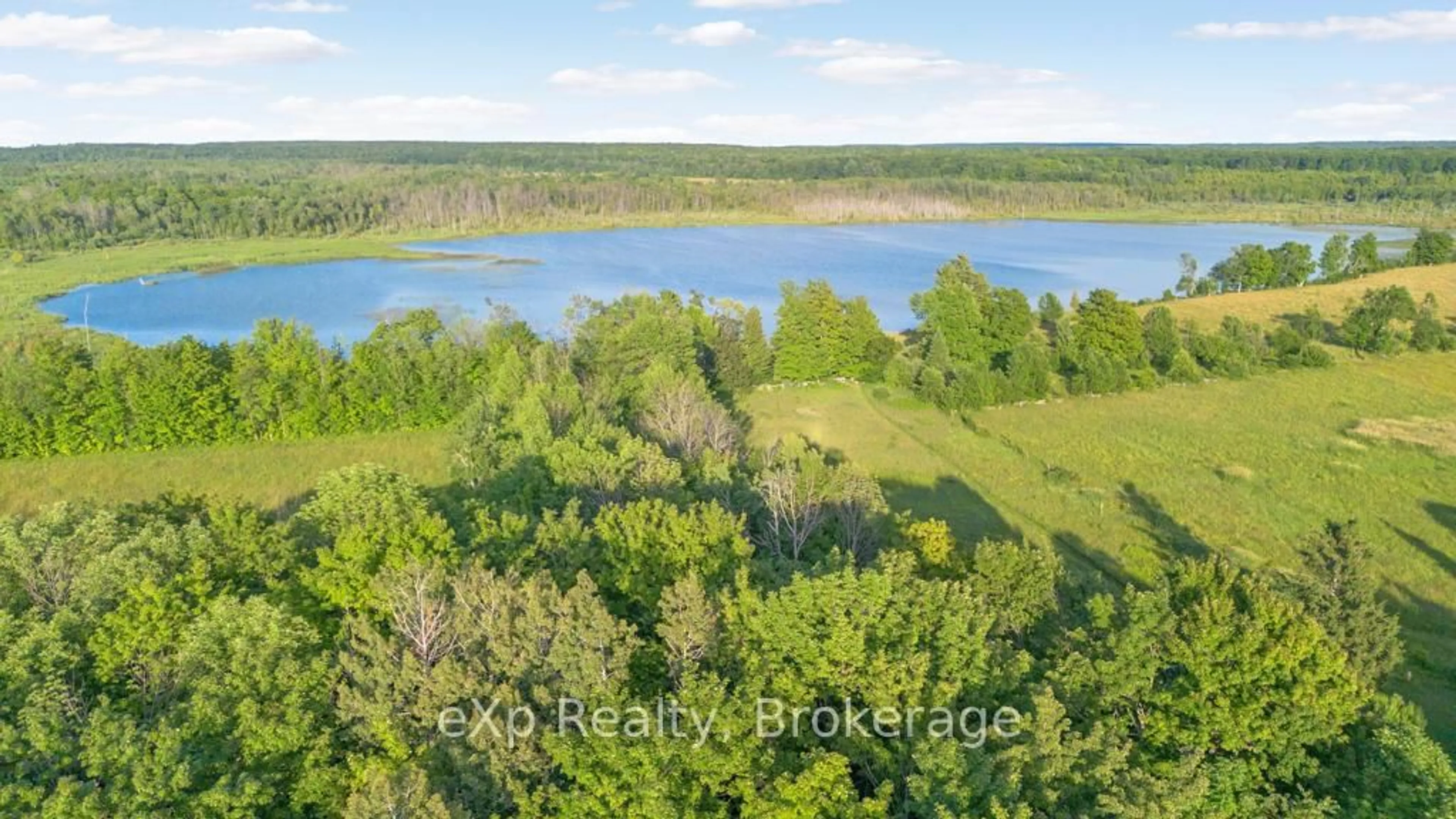 A pic from outside/outdoor area/front of a property/back of a property/a pic from drone, water/lake/river/ocean view for 482475 Colpoy's Range Rd, Georgian Bluffs Ontario N0H 2T0