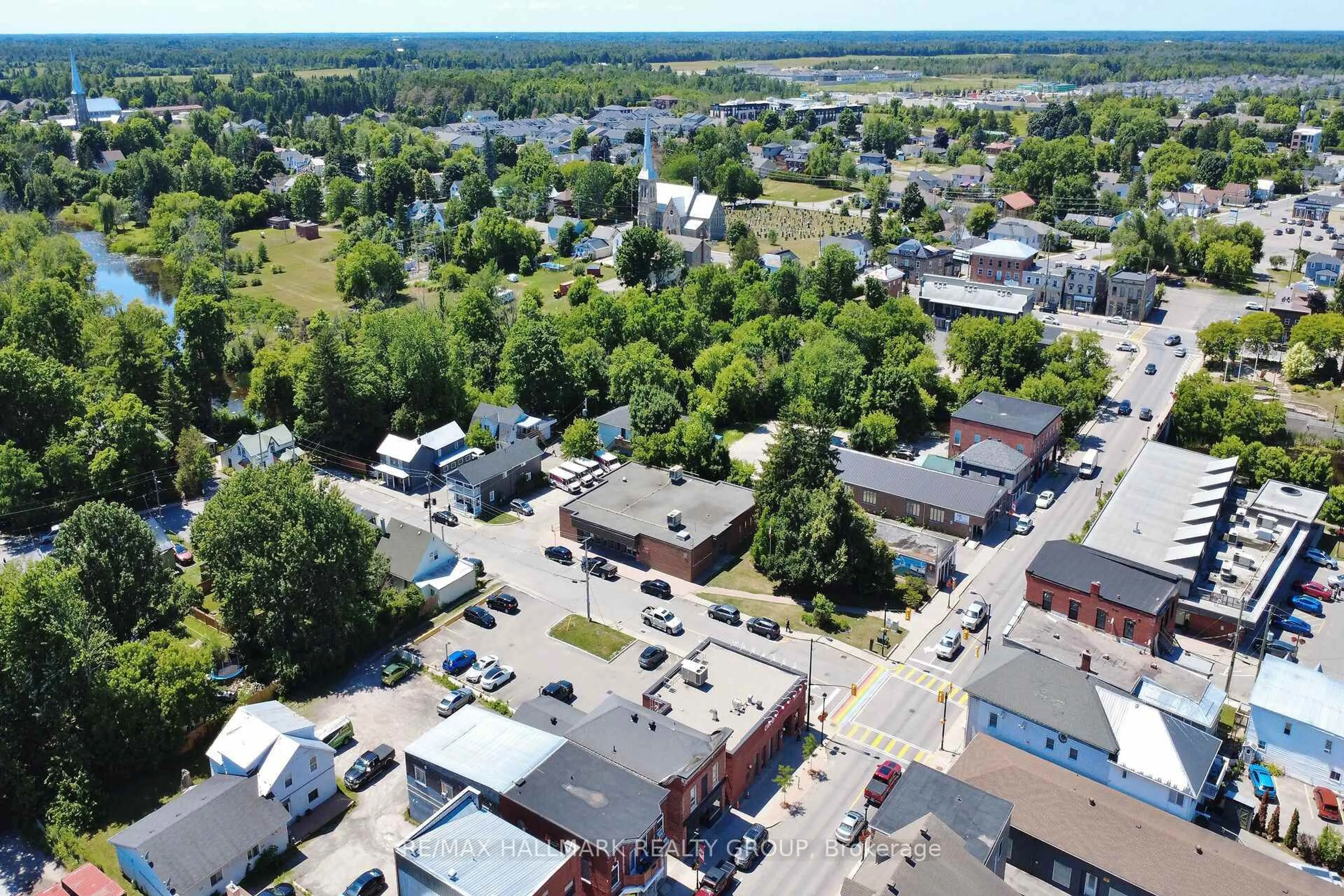 A pic from outside/outdoor area/front of a property/back of a property/a pic from drone, street for 126-128 Prescott St #128, North Grenville Ontario K0G 1J0
