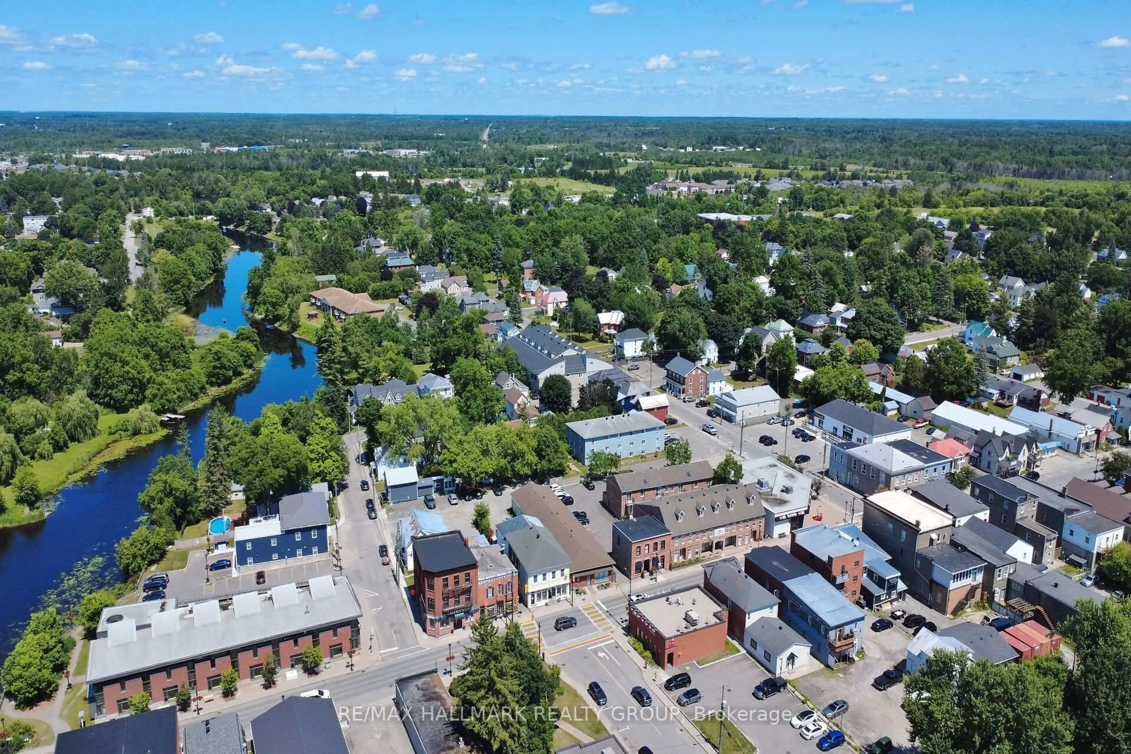 A pic from outside/outdoor area/front of a property/back of a property/a pic from drone, street for 126-128 Prescott St #128, North Grenville Ontario K0G 1J0