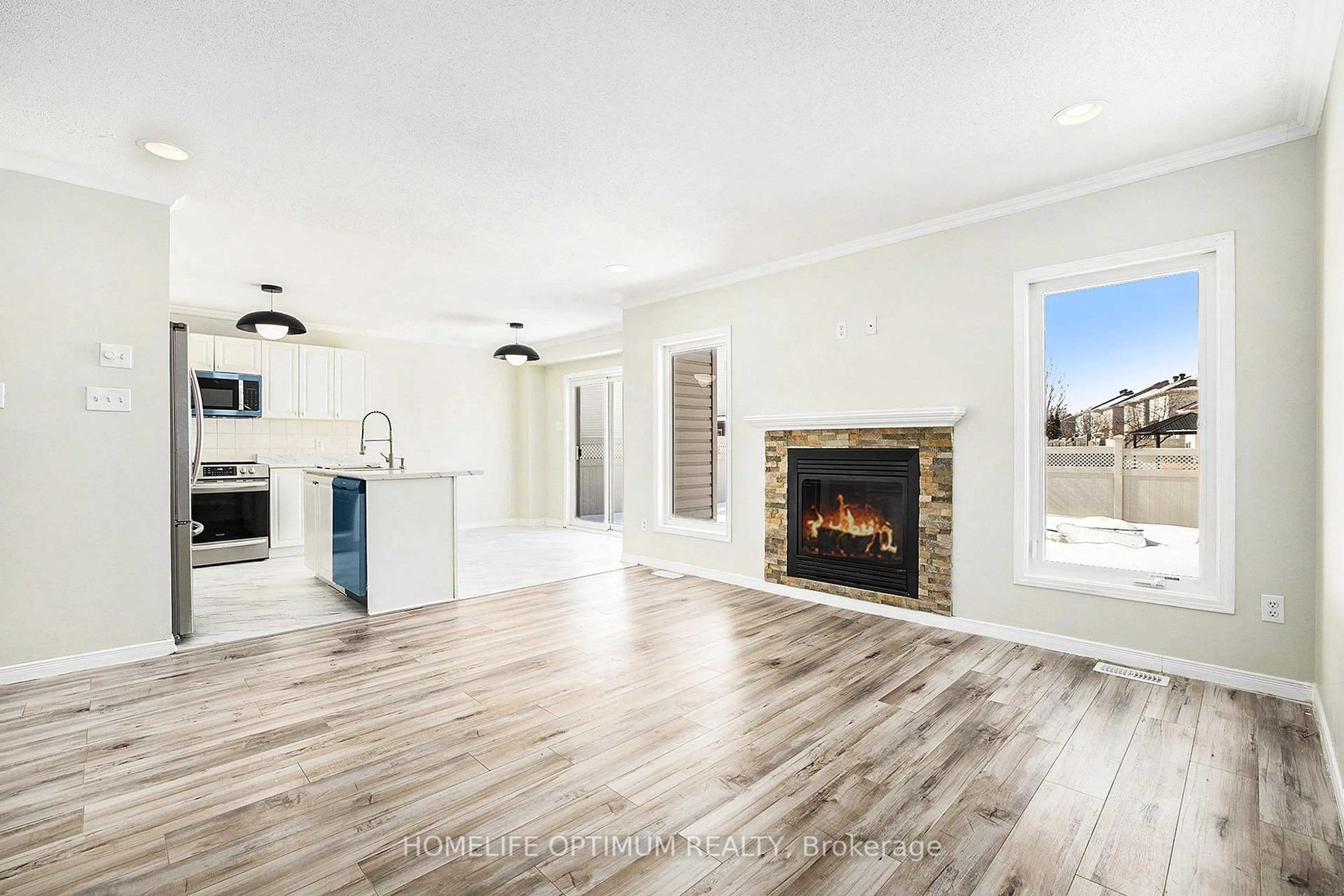 Open concept kitchen, wood/laminate floor for 863 Taradale Dr, Ottawa Ontario K2J 5P3