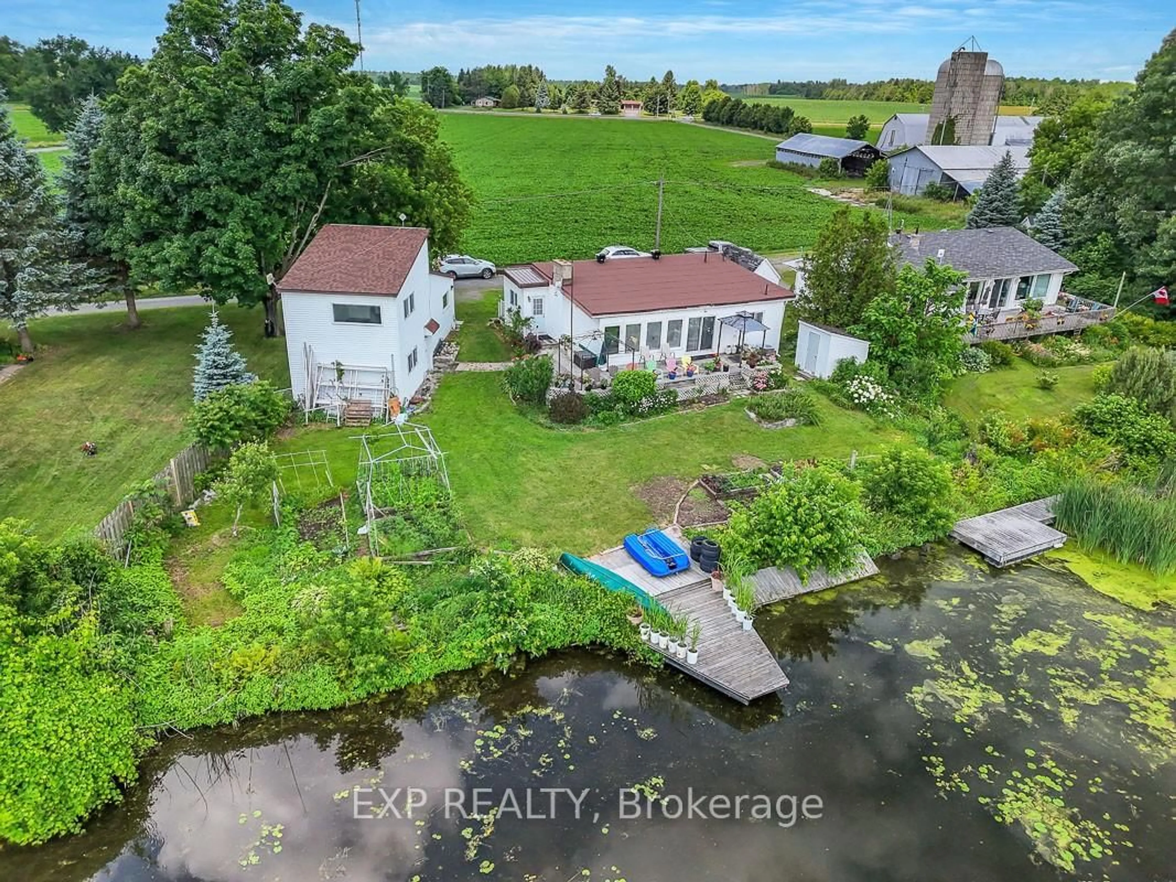 A pic from outside/outdoor area/front of a property/back of a property/a pic from drone, water/lake/river/ocean view for 2986 Beaman Lane, Manotick Ontario K9G 1J0