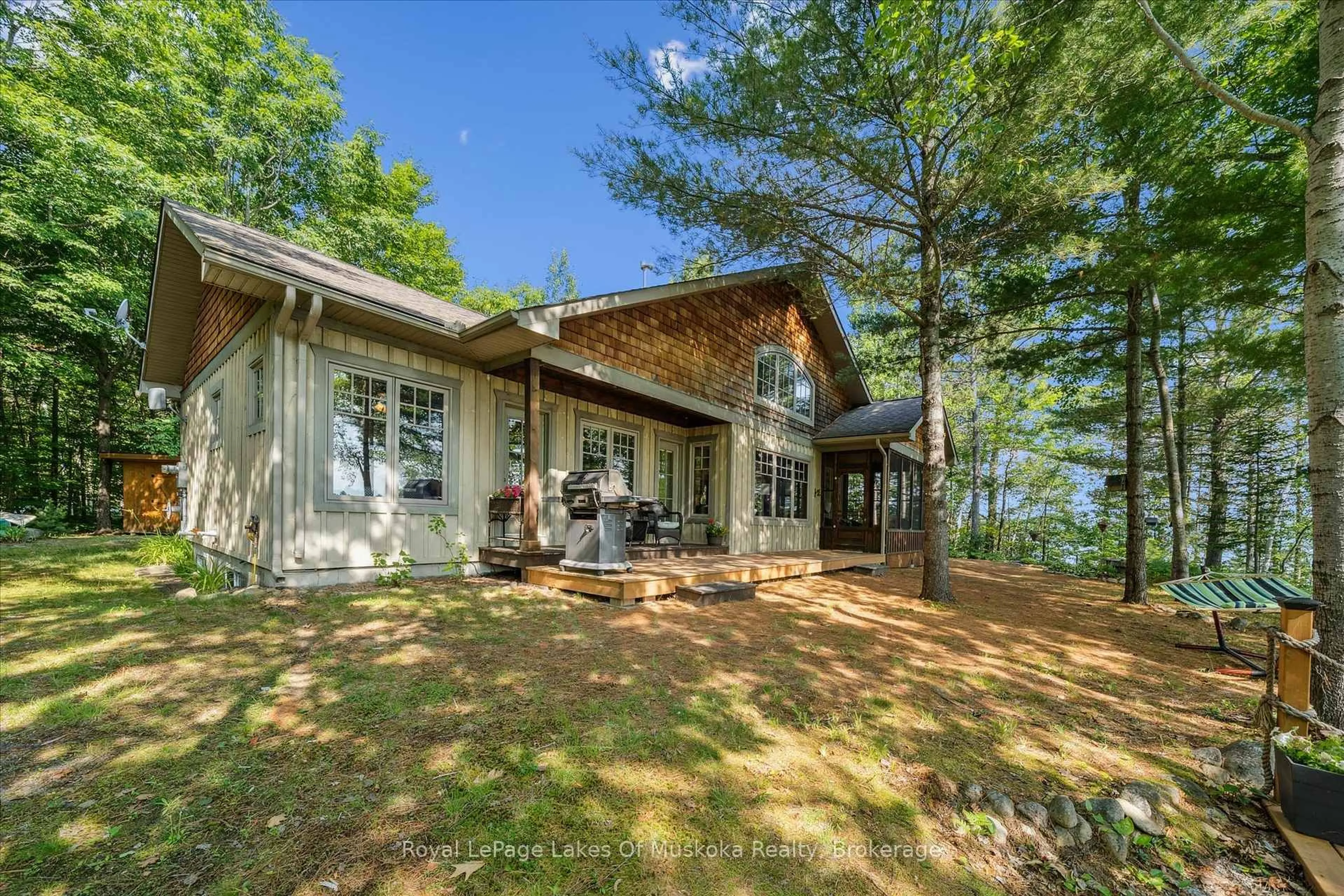 A pic from outside/outdoor area/front of a property/back of a property/a pic from drone, unknown for 1176 McComb Point Dr, Algonquin Highlands Ontario P0A 1E0