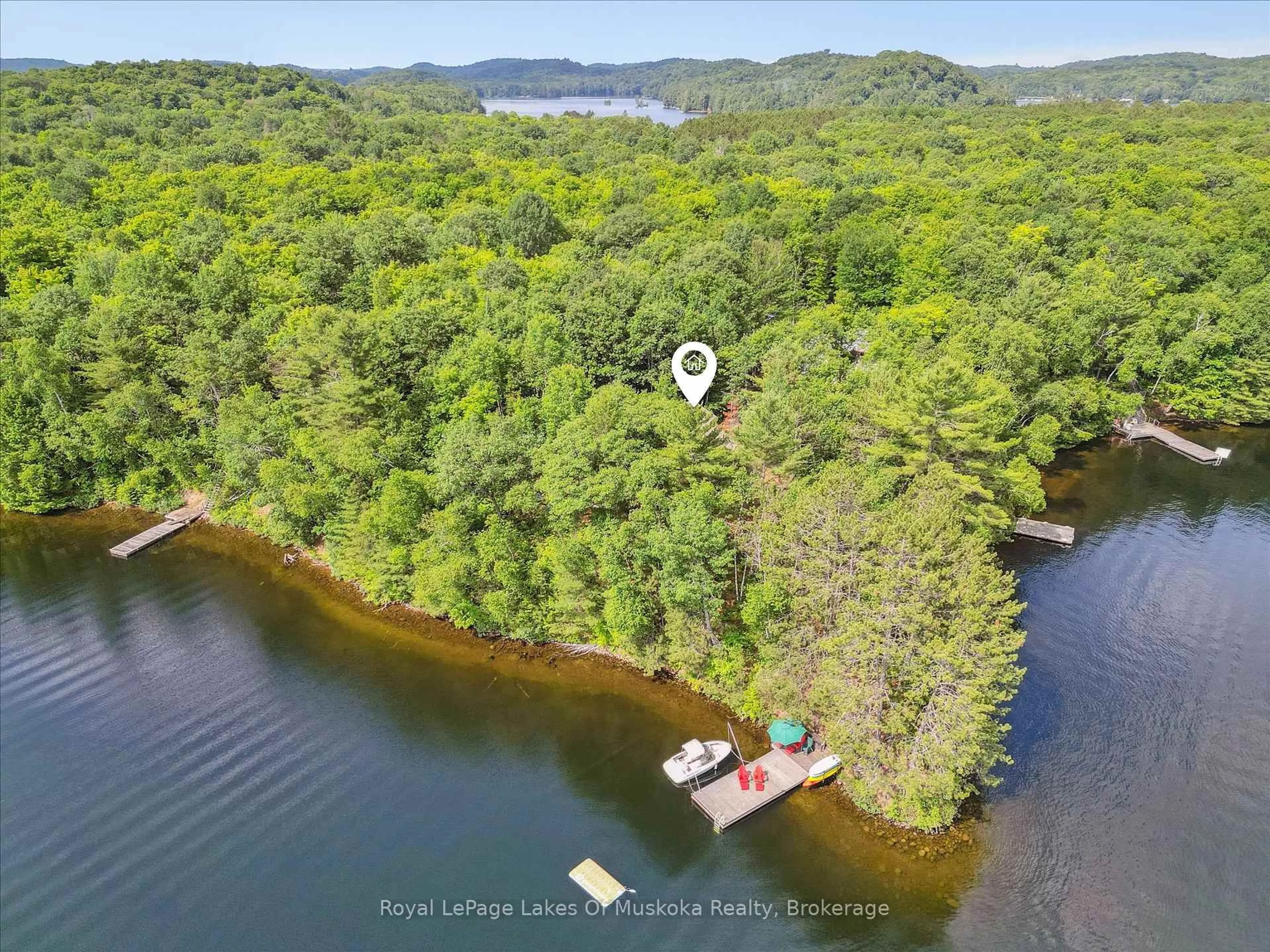 A pic from outside/outdoor area/front of a property/back of a property/a pic from drone, water/lake/river/ocean view for 1176 McComb Point Dr, Algonquin Highlands Ontario P0A 1E0