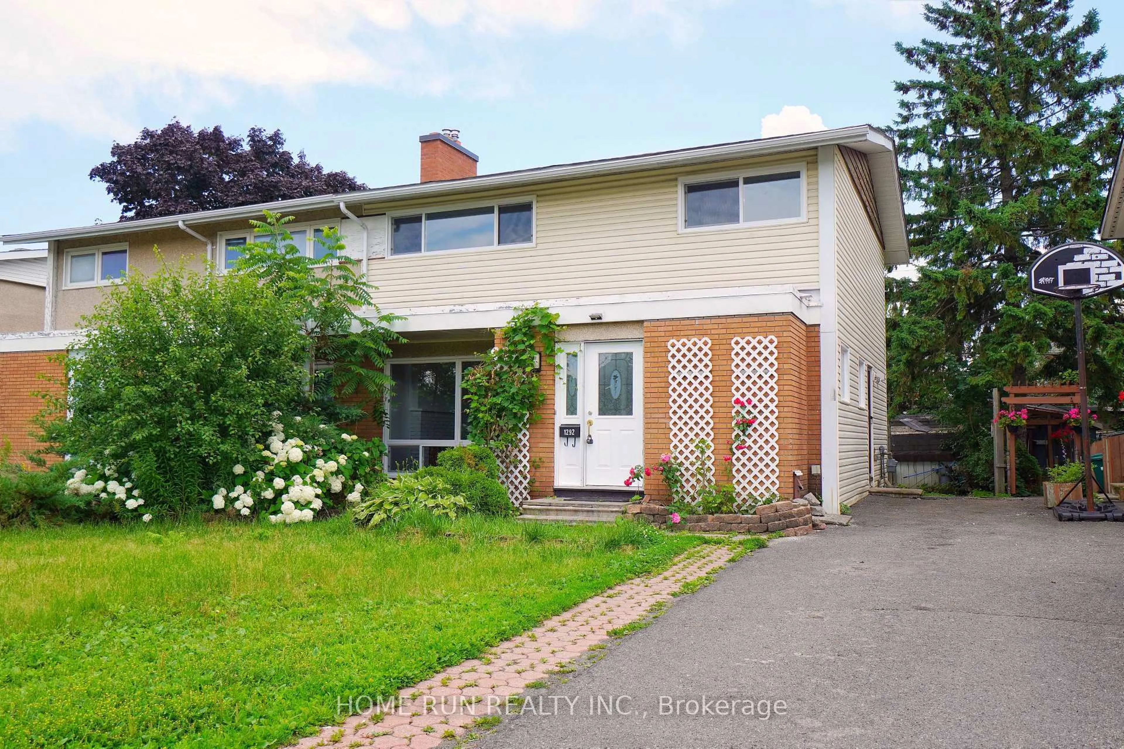 Home with brick exterior material, street for 1292 MEADOWLANDS Dr, Ottawa Ontario K2E 6K5