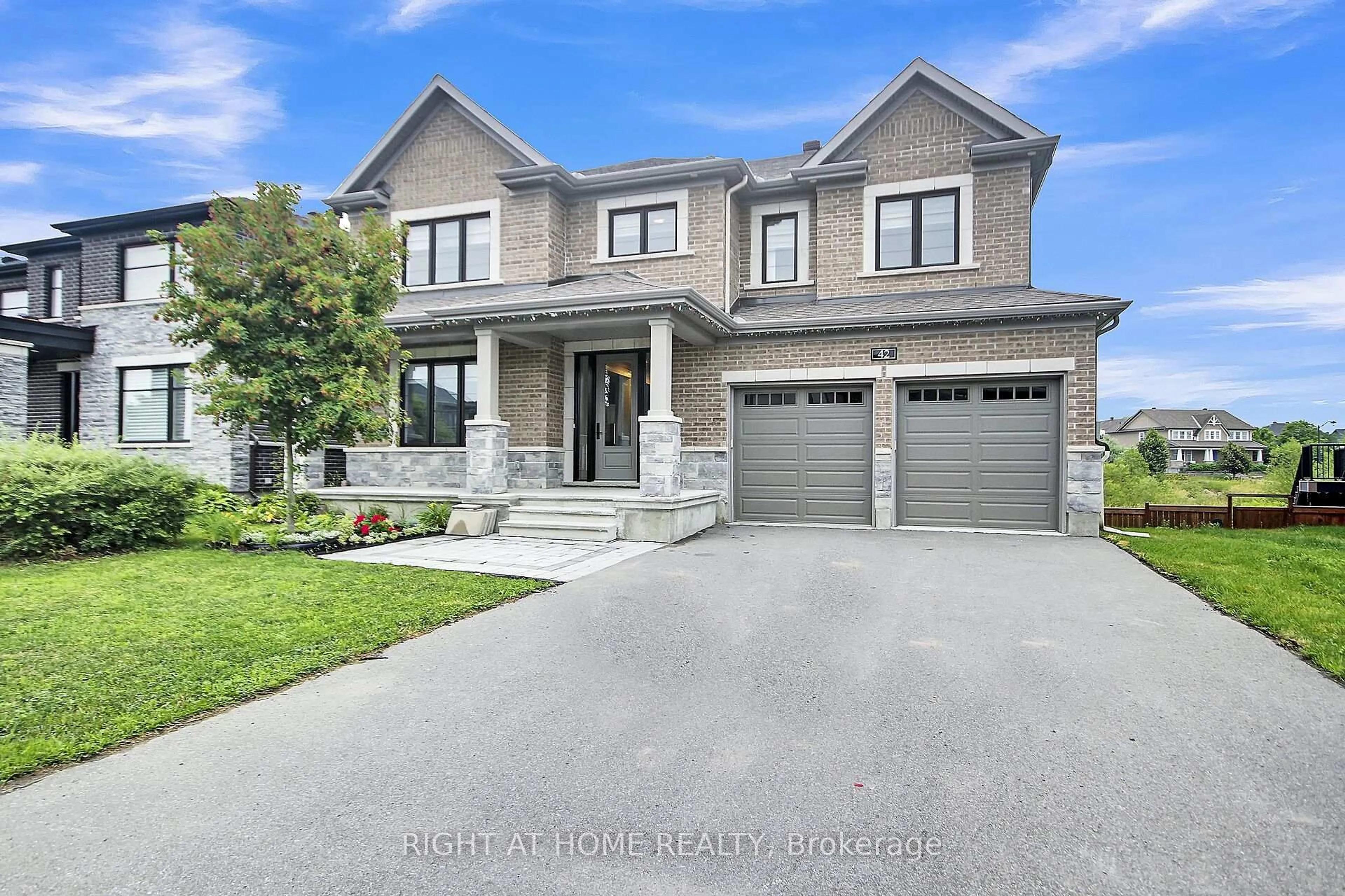 Home with brick exterior material, street for 42 CONCH Way, Manotick Ontario K4M 0M4