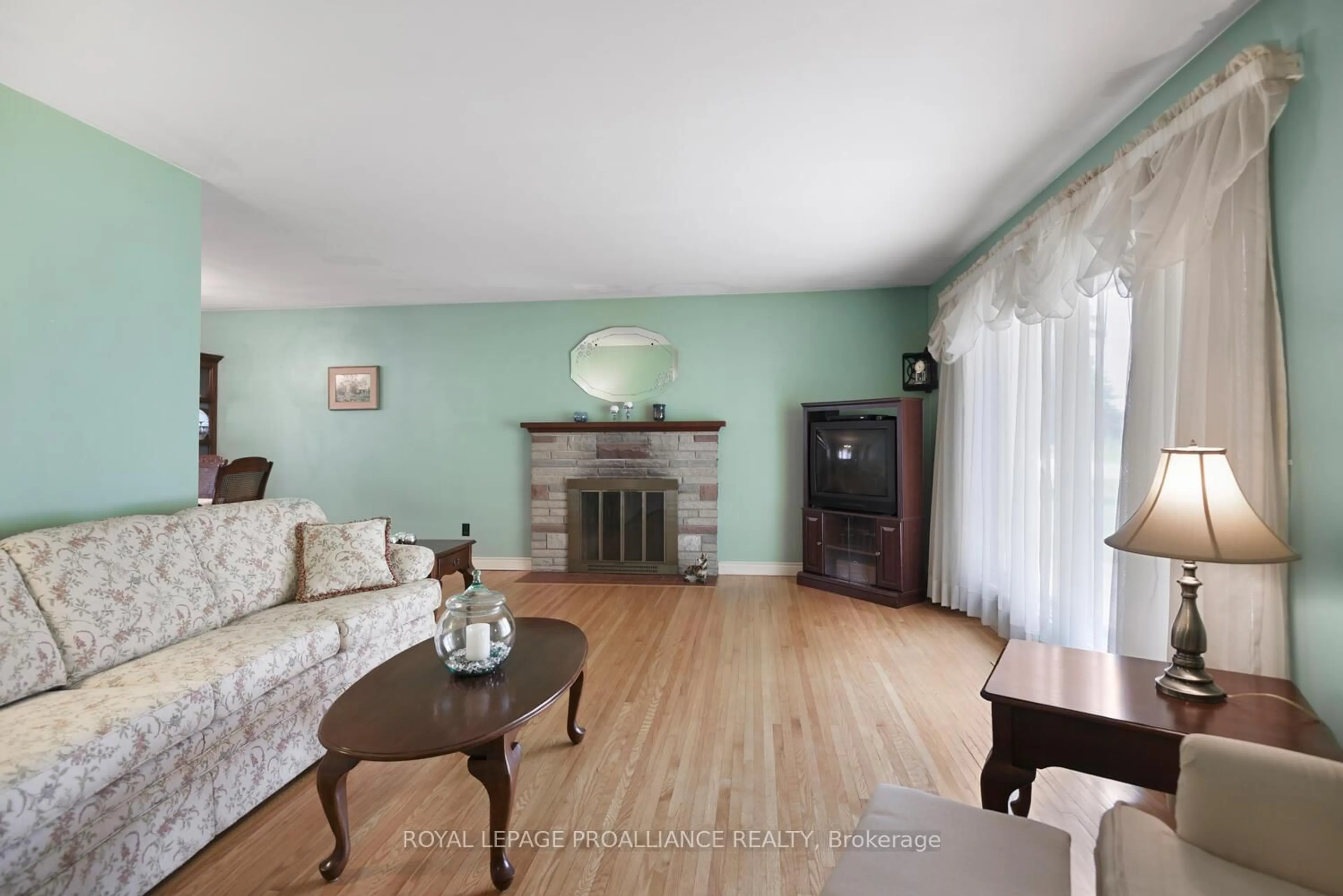 Living room with furniture, wood/laminate floor for 3507 Charleville Rd, Augusta Ontario K0E 1T0