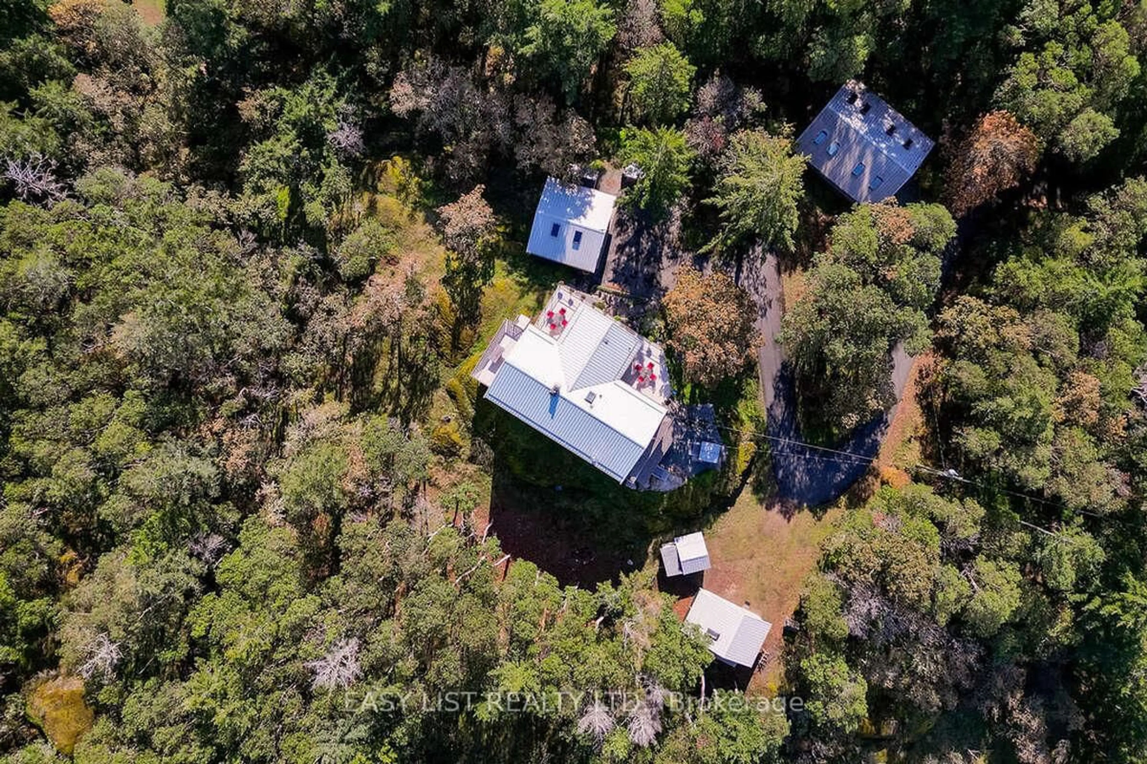 A pic from outside/outdoor area/front of a property/back of a property/a pic from drone, forest/trees view for 4801 Excelsior Rd, Out of Area British Columbia V9E 2E5