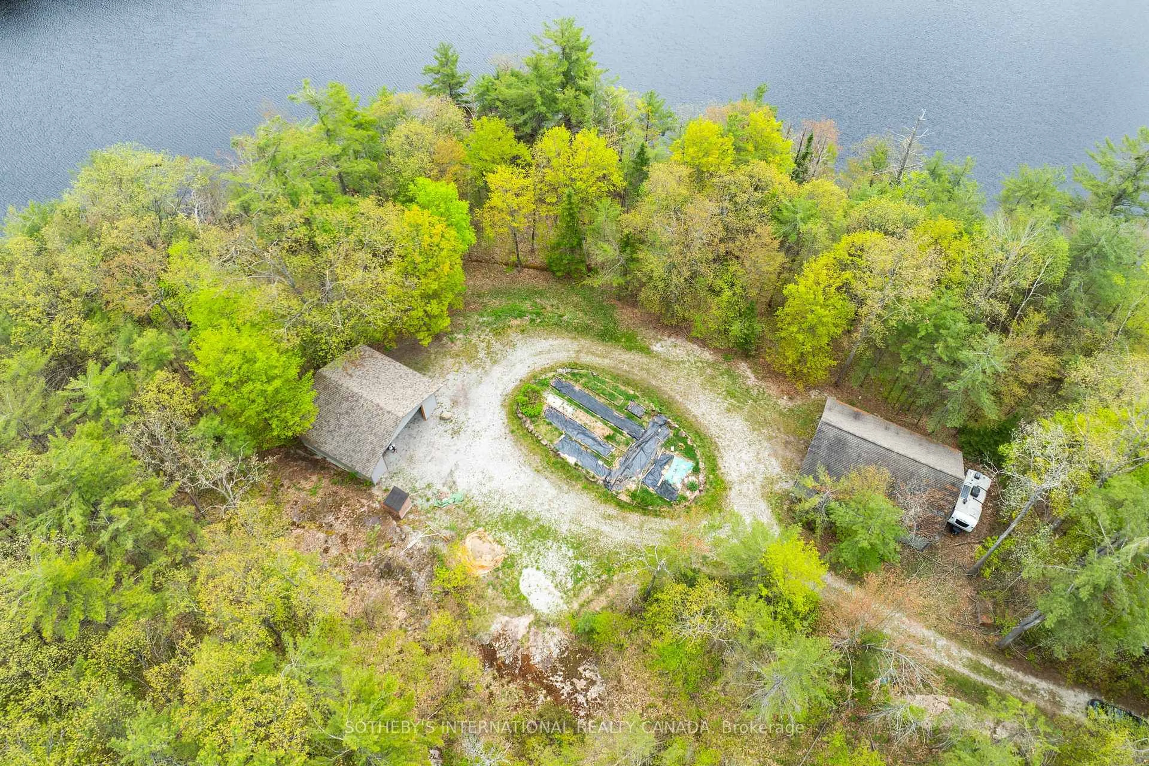 A pic from outside/outdoor area/front of a property/back of a property/a pic from drone, water/lake/river/ocean view for 1074 Cooks Rd, Gravenhurst Ontario P1P 1R3
