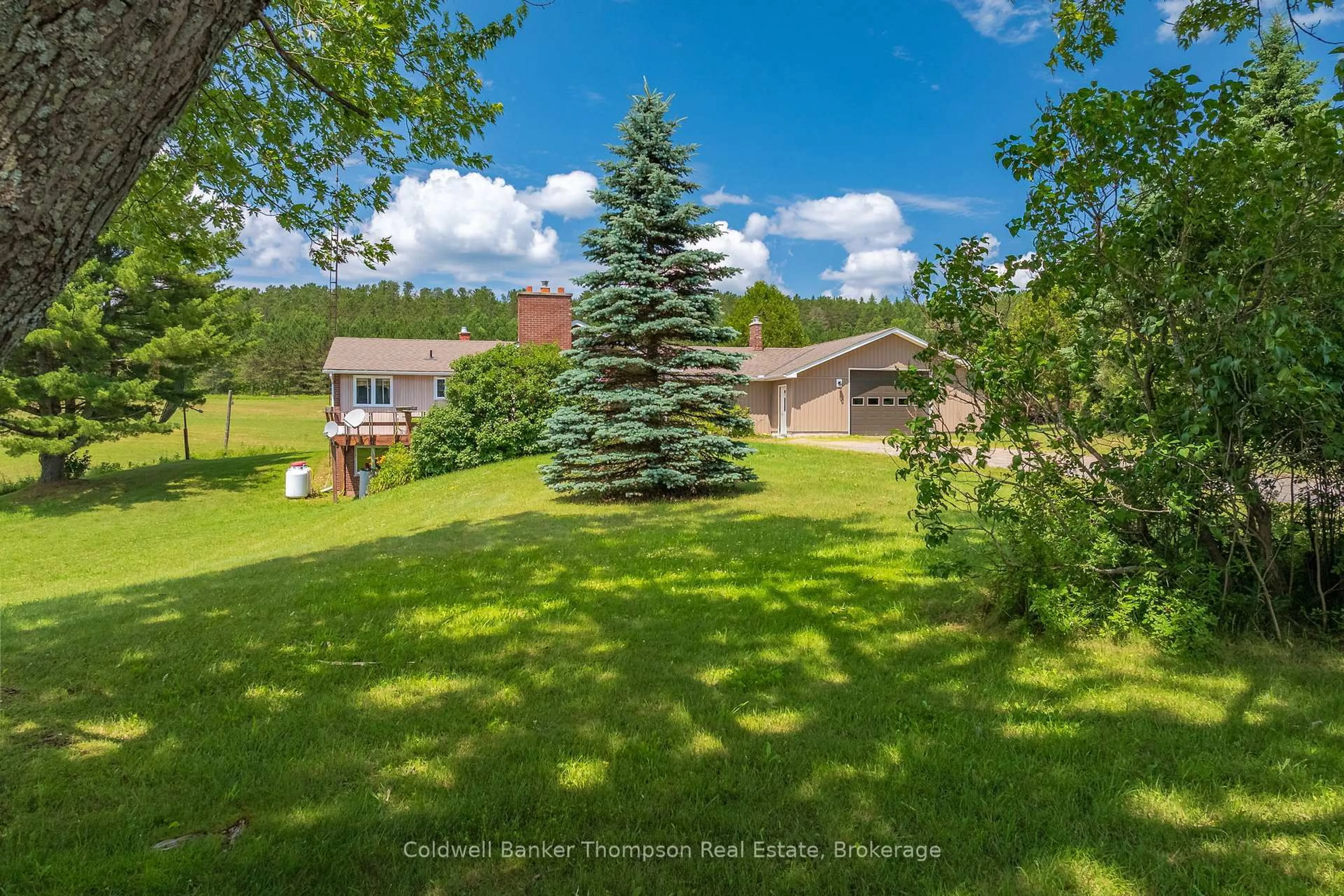 A pic from outside/outdoor area/front of a property/back of a property/a pic from drone, unknown for 832 Chetwynd Rd, Armour Ontario P0A 1C0