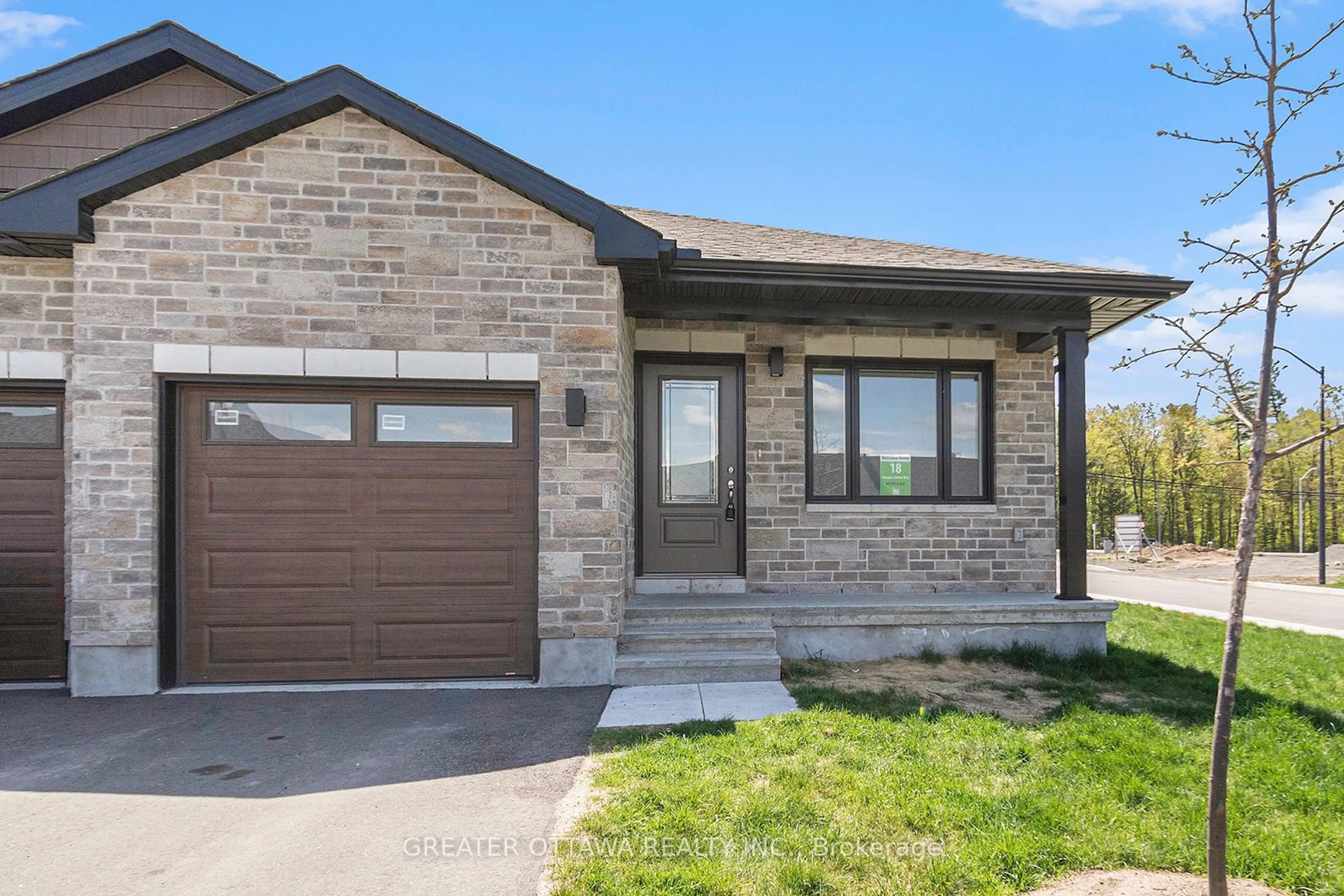 Home with brick exterior material, street for 18 Morgan Clouthier Way, Arnprior Ontario K7S 0K1