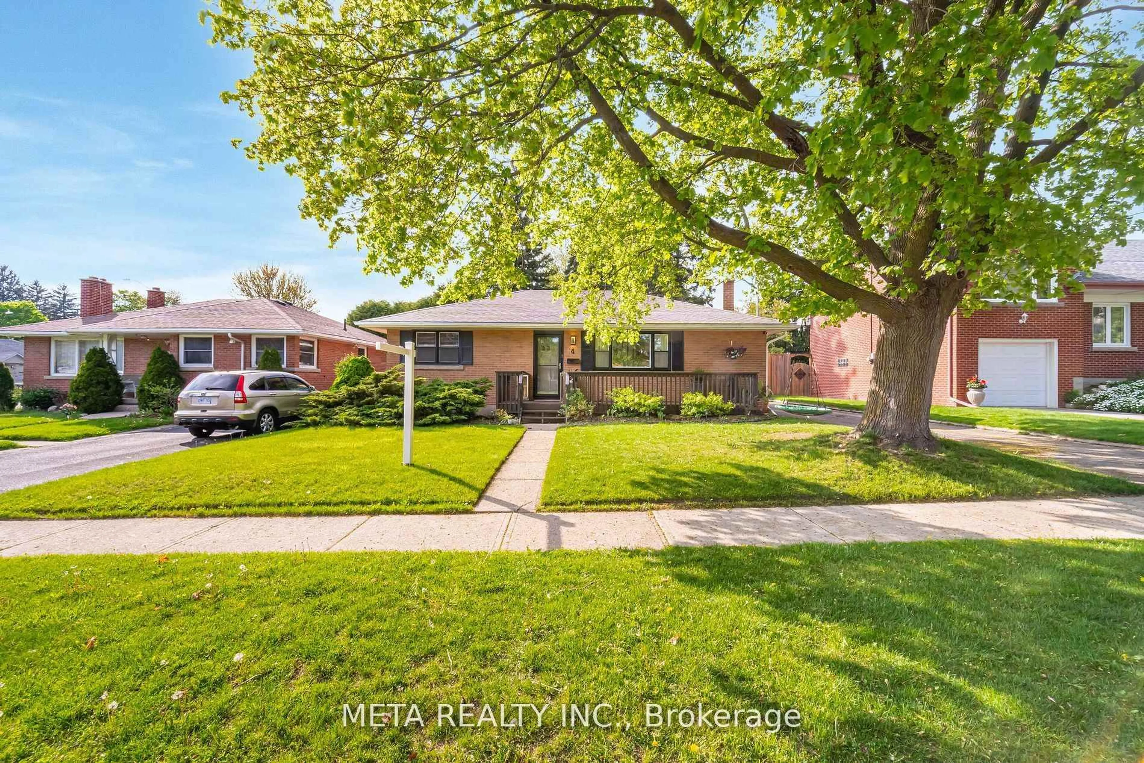 Home with brick exterior material, street for 4 Greenview St, Guelph Ontario N1E 2Y3