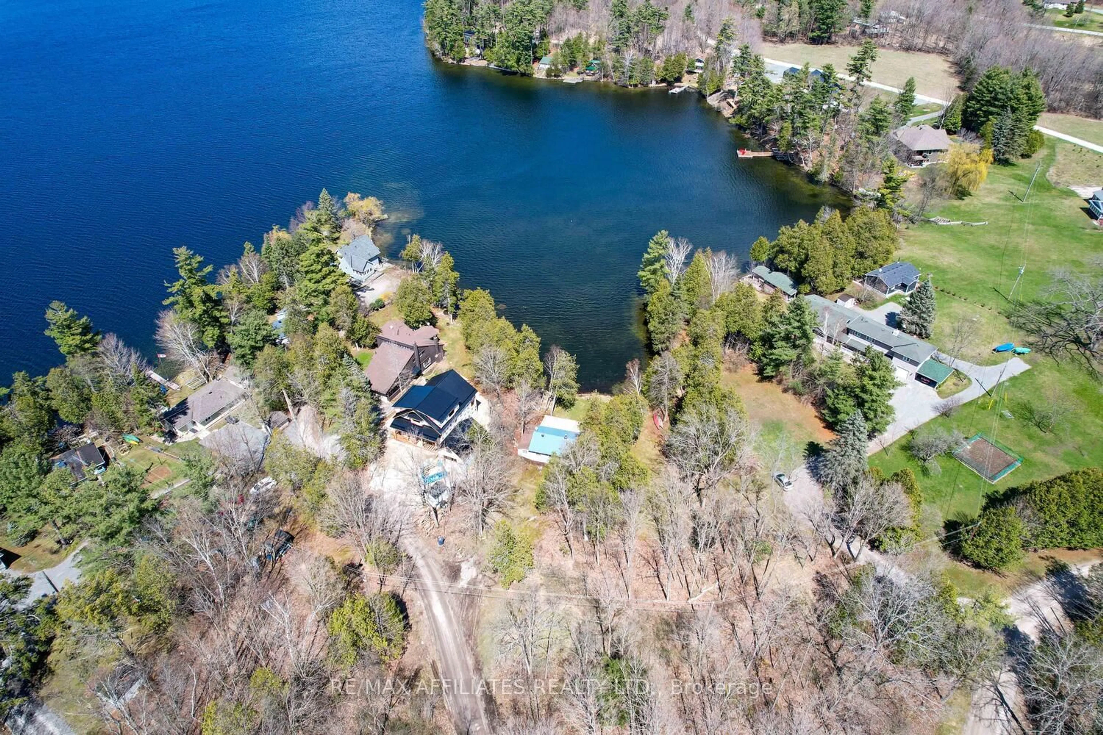 A pic from outside/outdoor area/front of a property/back of a property/a pic from drone, water/lake/river/ocean view for 730 Dunc's Point Rd, Perth Ontario K7H 3C7