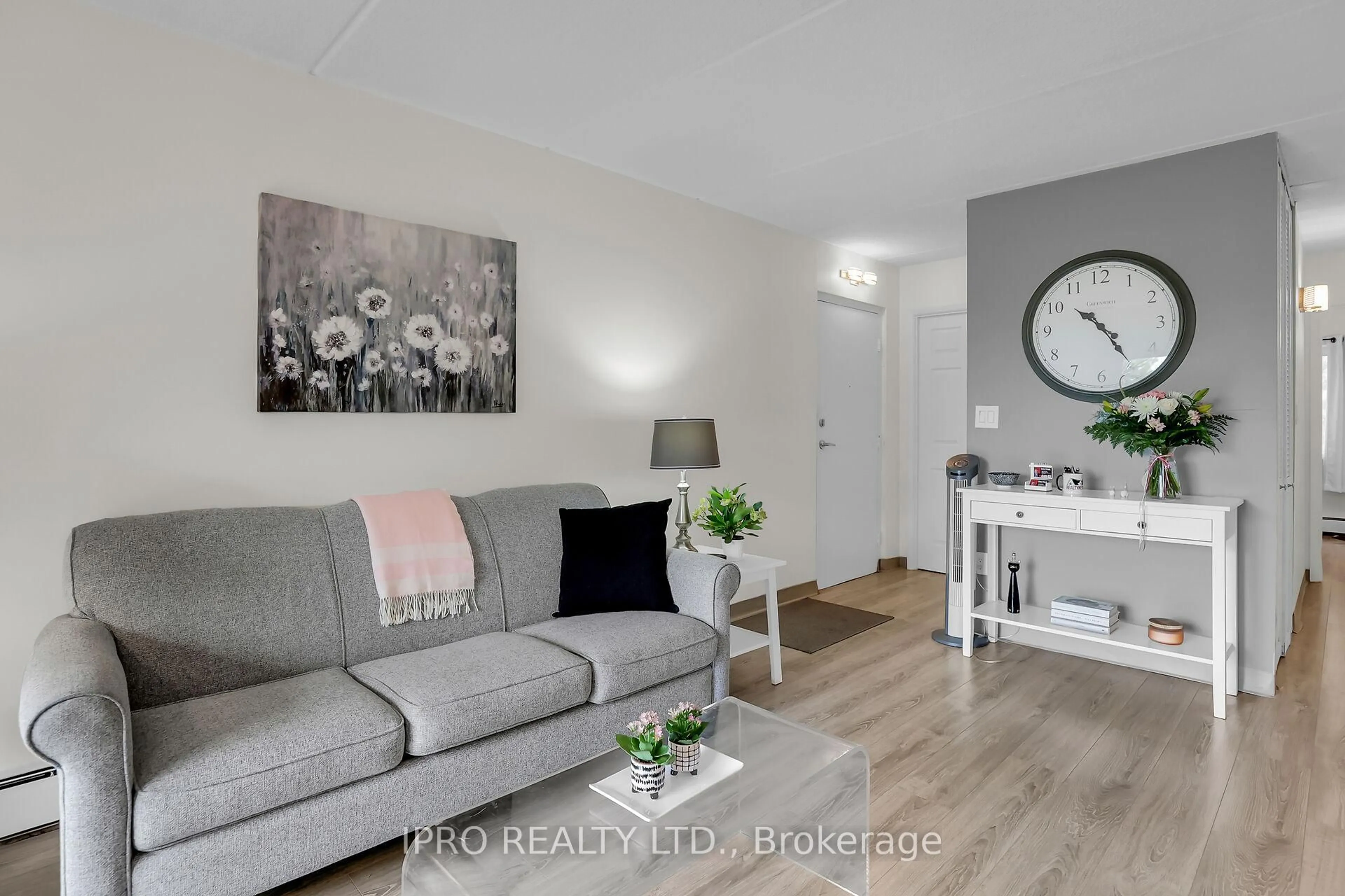 Living room with furniture, wood/laminate floor for 6 Westlake Lane #301, St. Catharines Ontario L2N 5S3