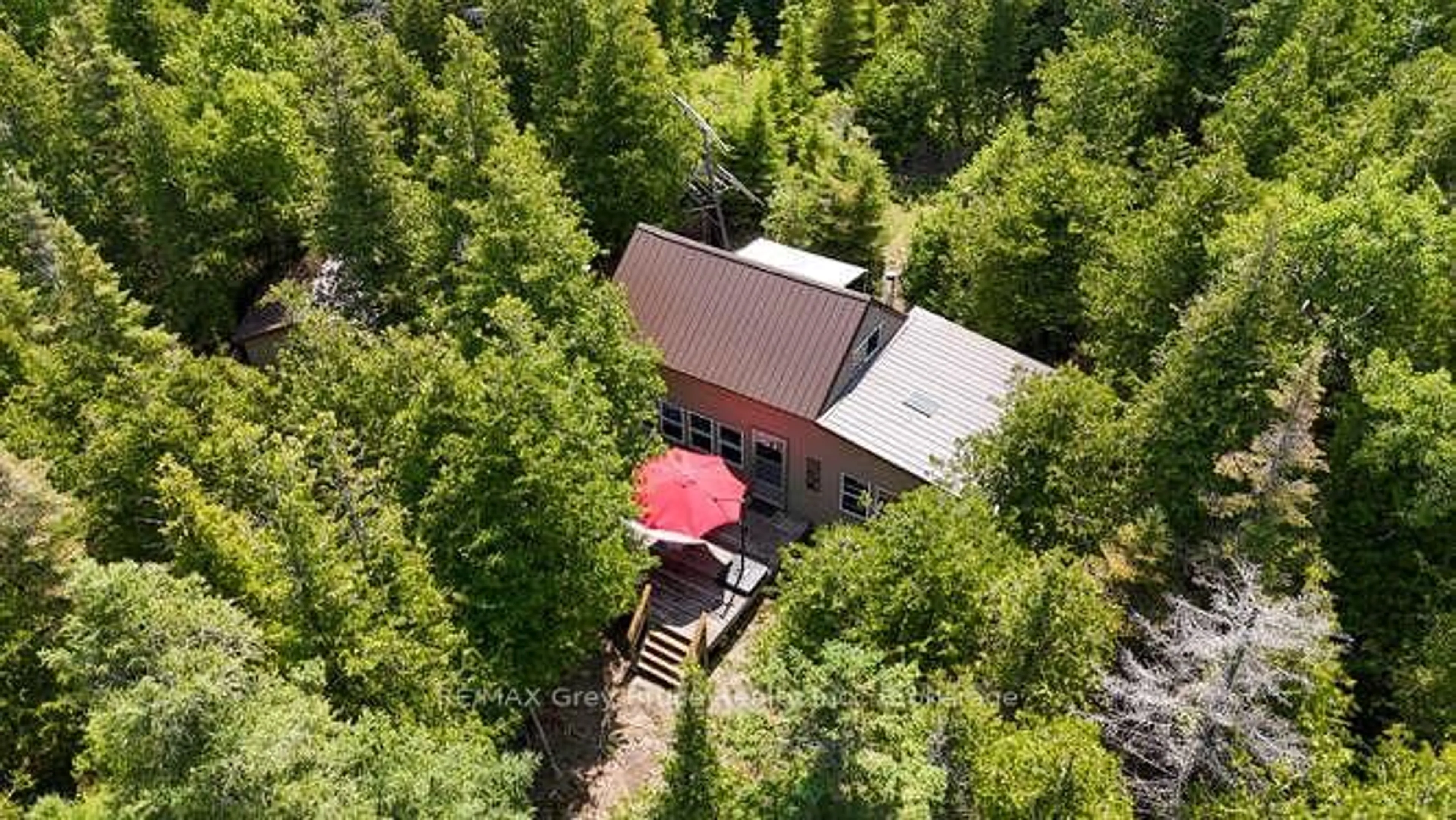 A pic from outside/outdoor area/front of a property/back of a property/a pic from drone, forest/trees view for 74 Smokehouse Island, South Bruce Peninsula Ontario N0H 2T0