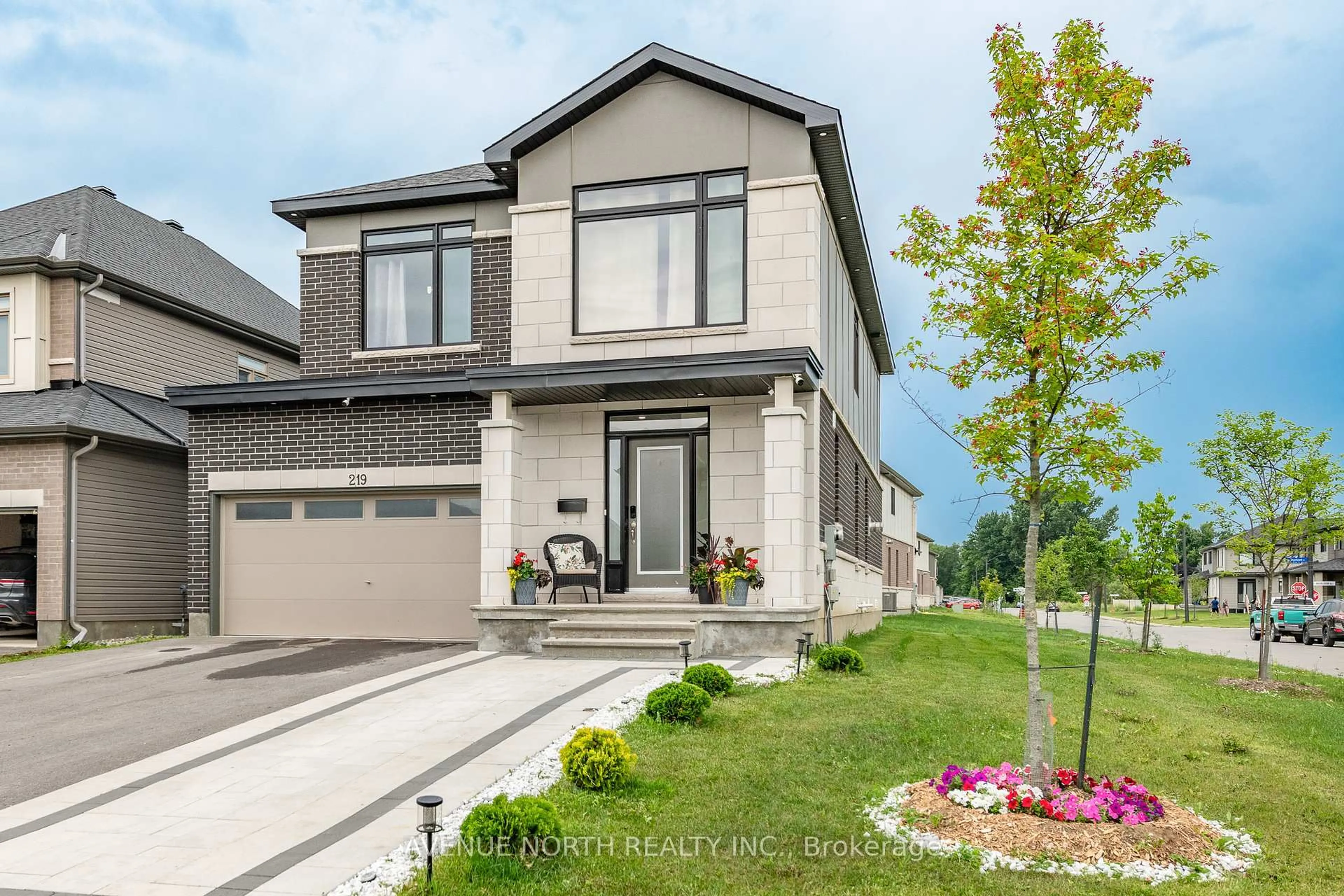 Home with brick exterior material, street for 219 Zinnia Way, Ottawa Ontario K4M 0K8