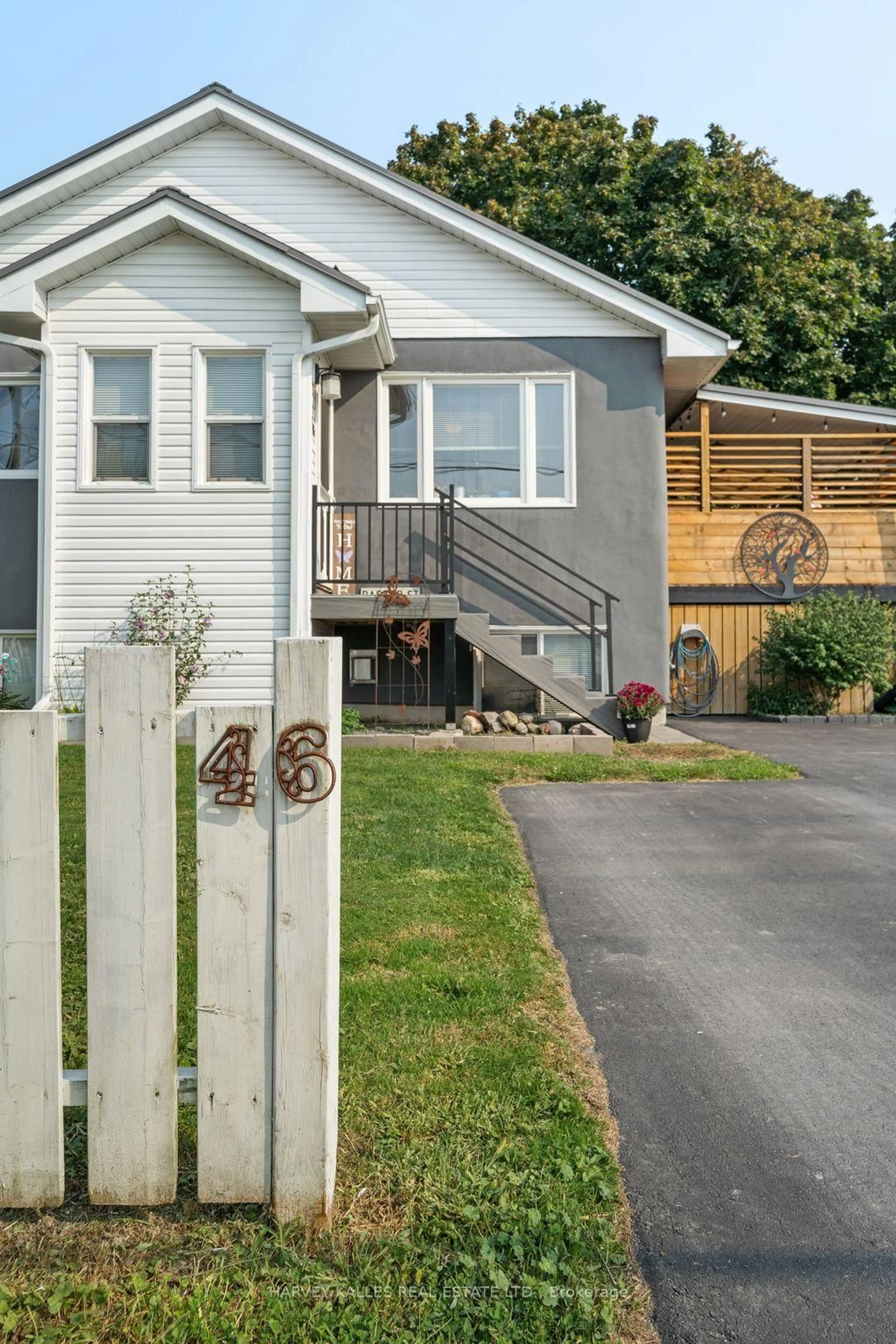 Home with vinyl exterior material, street for 46 Barker St, Prince Edward County Ontario K0K 2T0