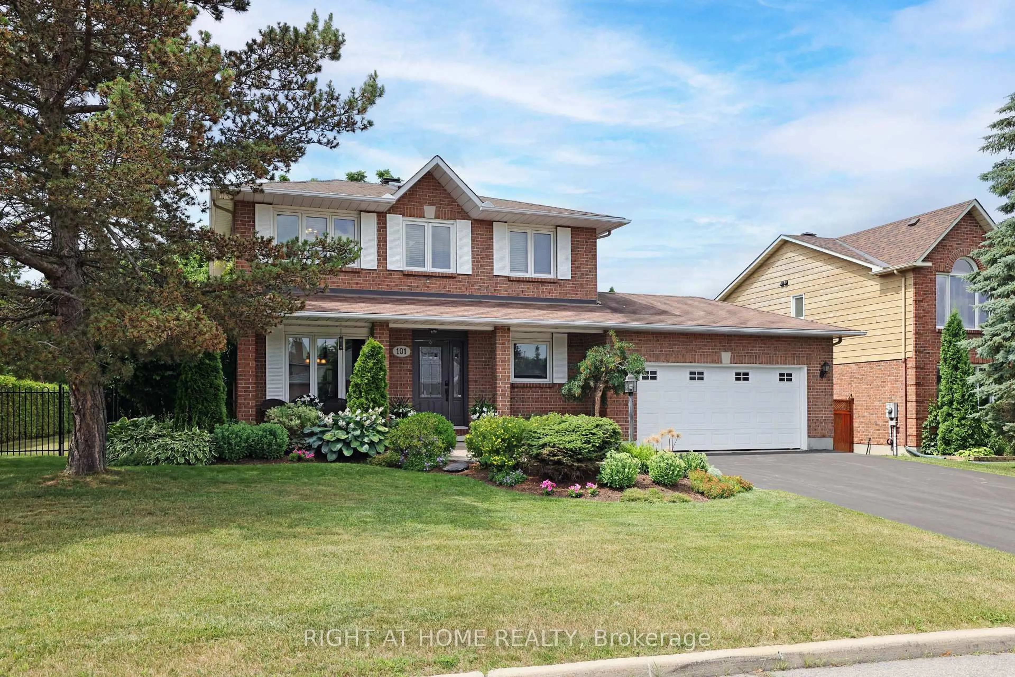 Home with brick exterior material, street for 101 Beechfern Dr, Stittsville Ontario K2S 1E3