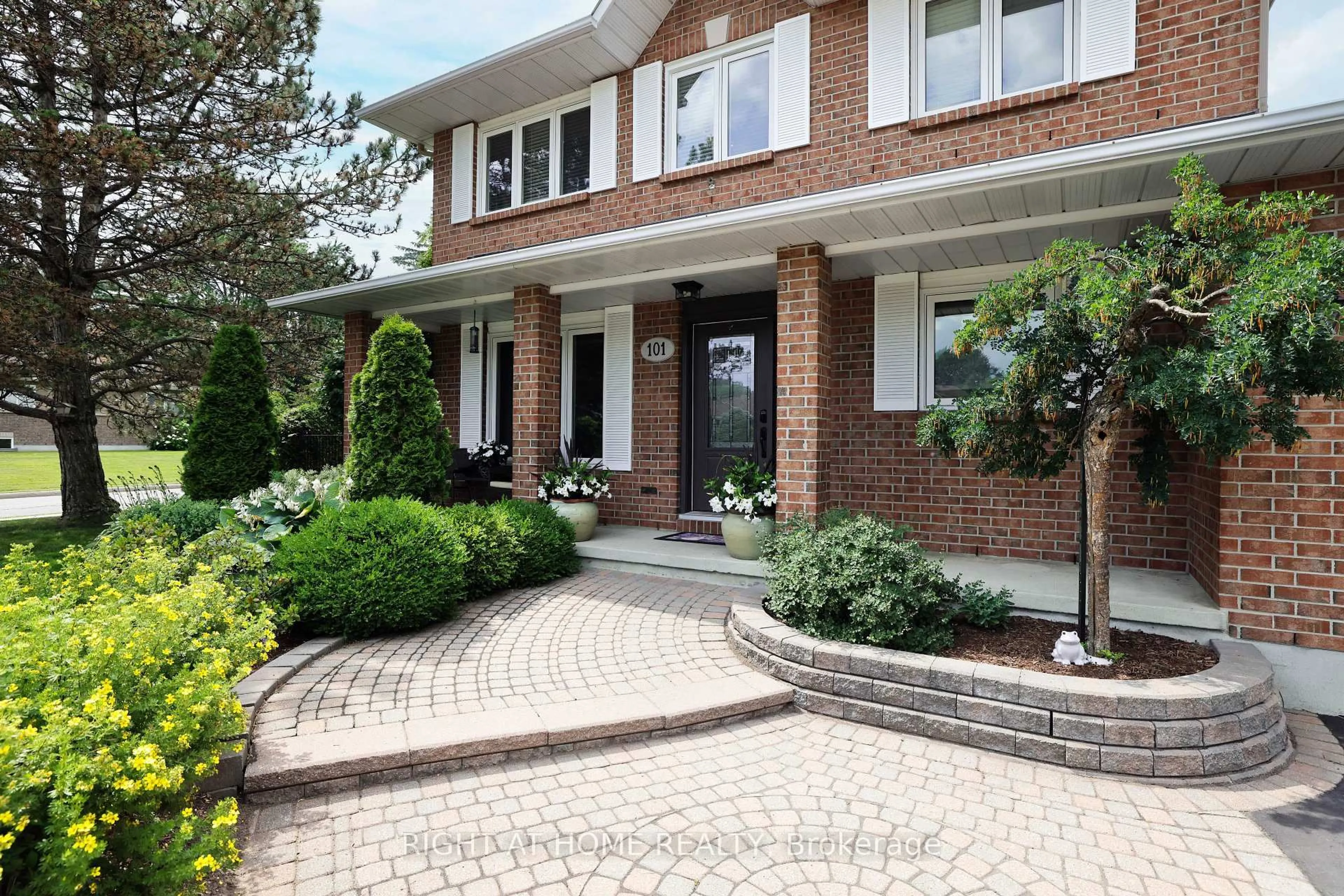 Home with brick exterior material, street for 101 Beechfern Dr, Stittsville Ontario K2S 1E3