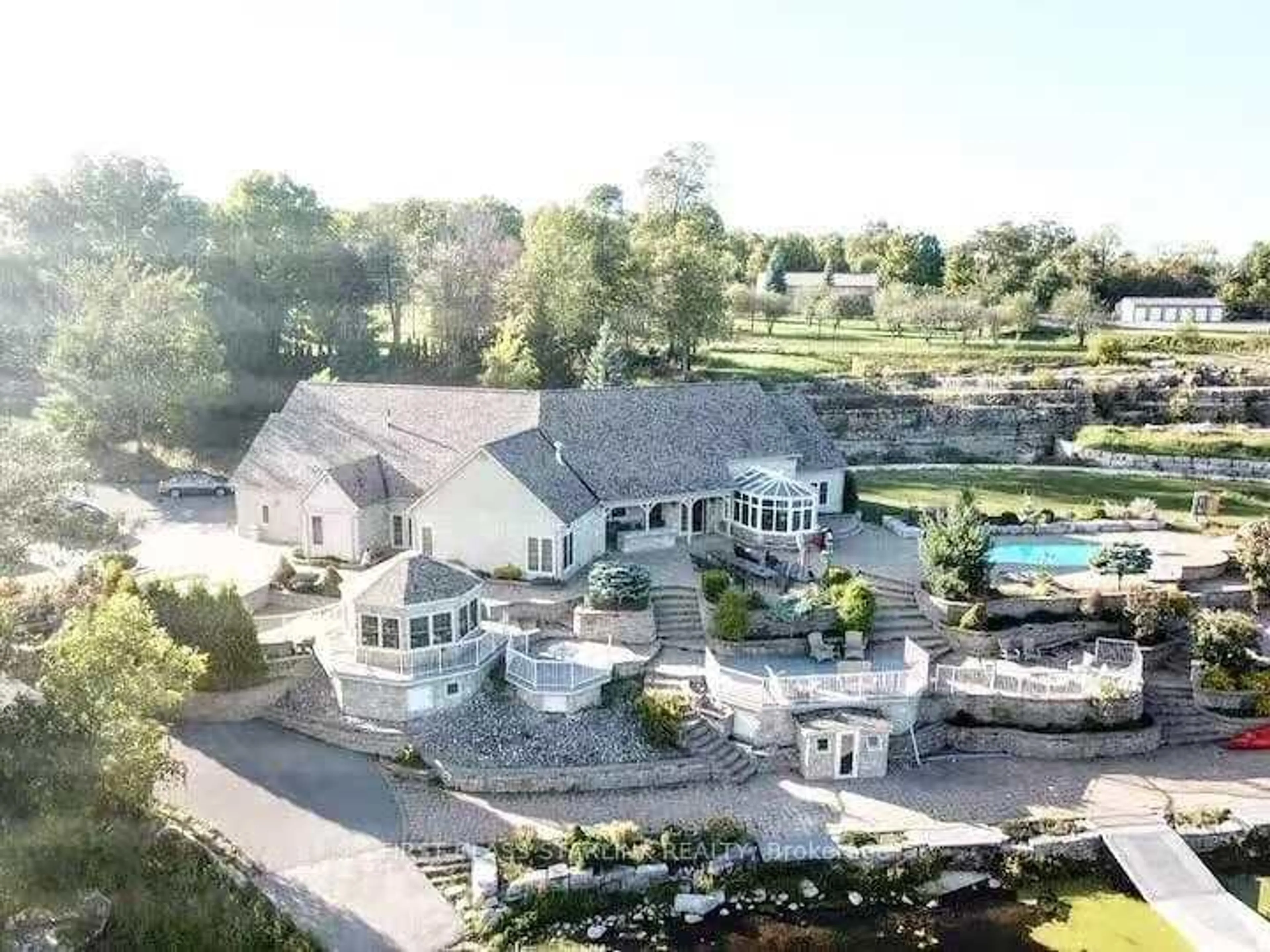 A pic from outside/outdoor area/front of a property/back of a property/a pic from drone, water/lake/river/ocean view for 3323 county Rd, Yarker Ontario K0K 3N0