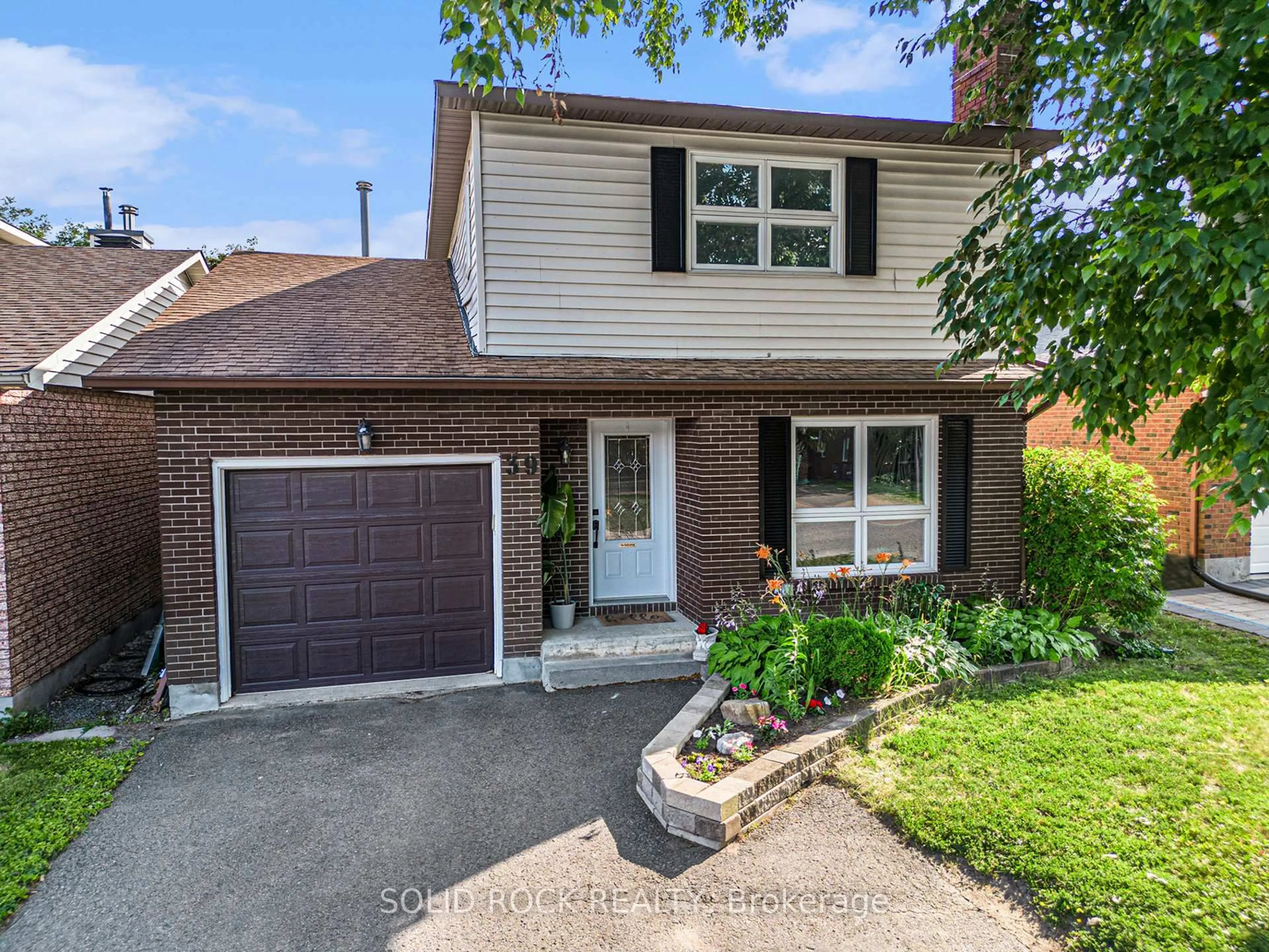 Home with brick exterior material, street for 39 Kadeer Way, Ottawa Ontario K2J 1J6