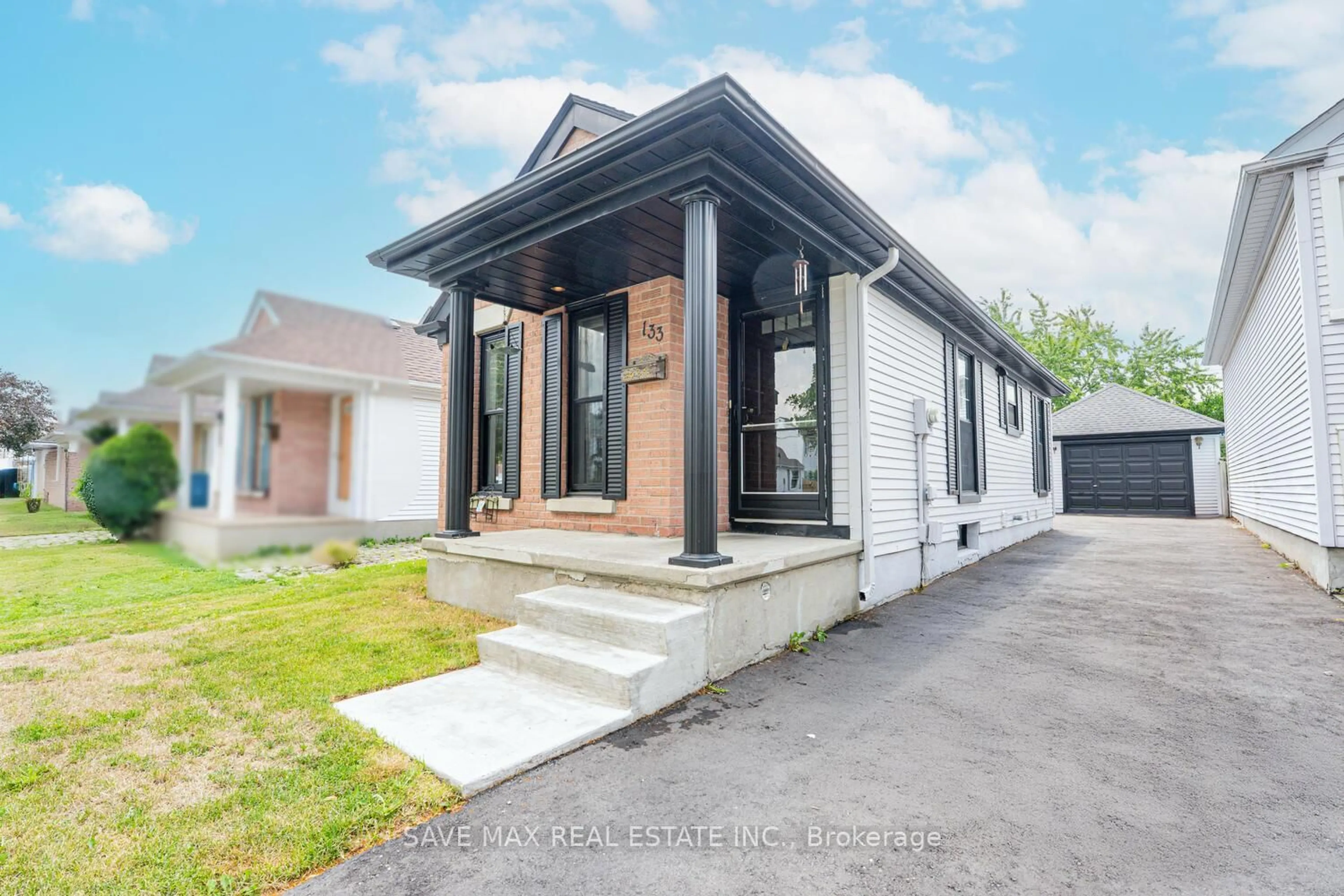Home with brick exterior material, street for 133 Wake Robin Dr, Kitchener Ontario N2E 3L6
