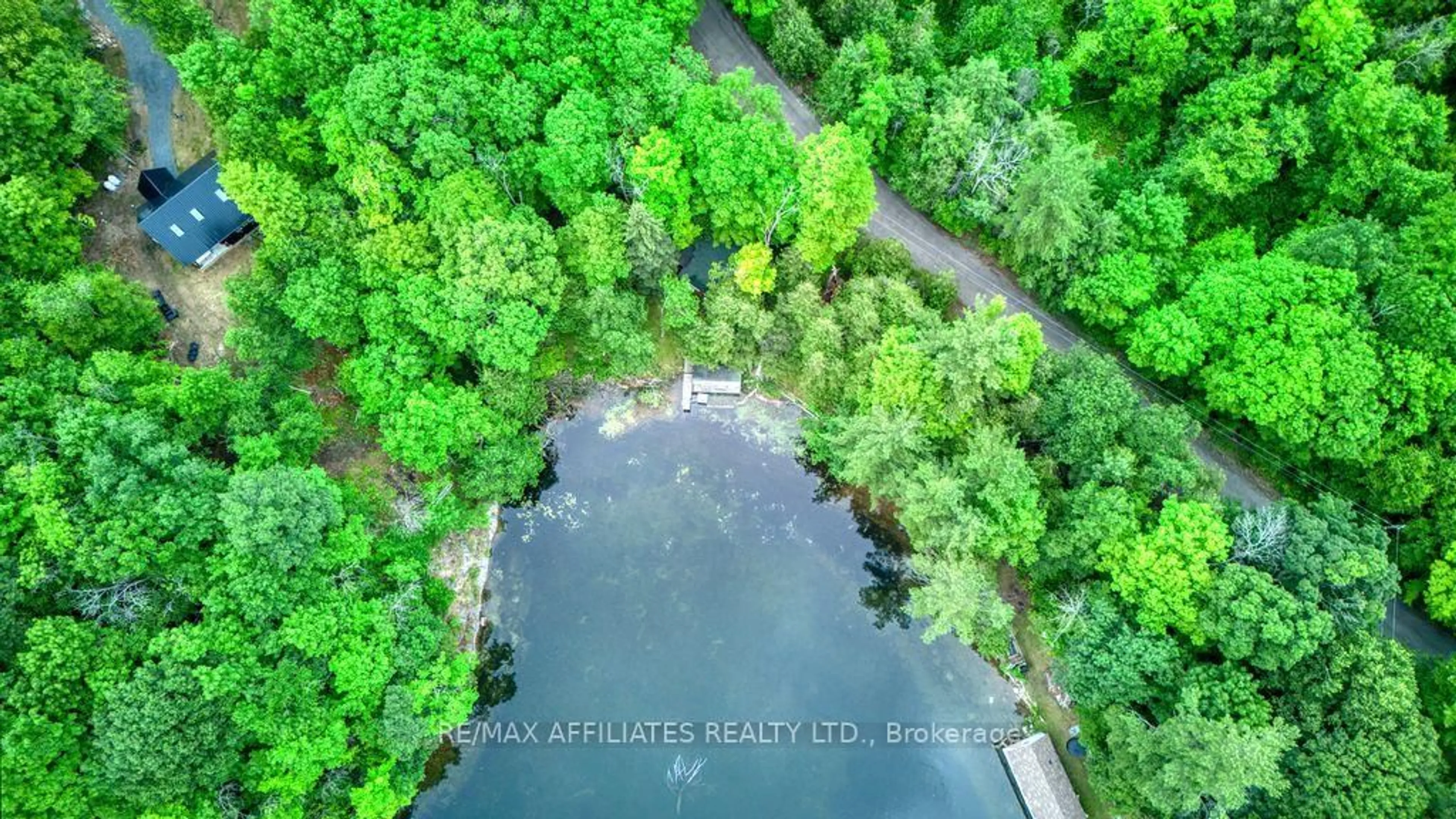 A pic from outside/outdoor area/front of a property/back of a property/a pic from drone, water/lake/river/ocean view for 323 Burns Rd, Godfrey Ontario K0H 1T0