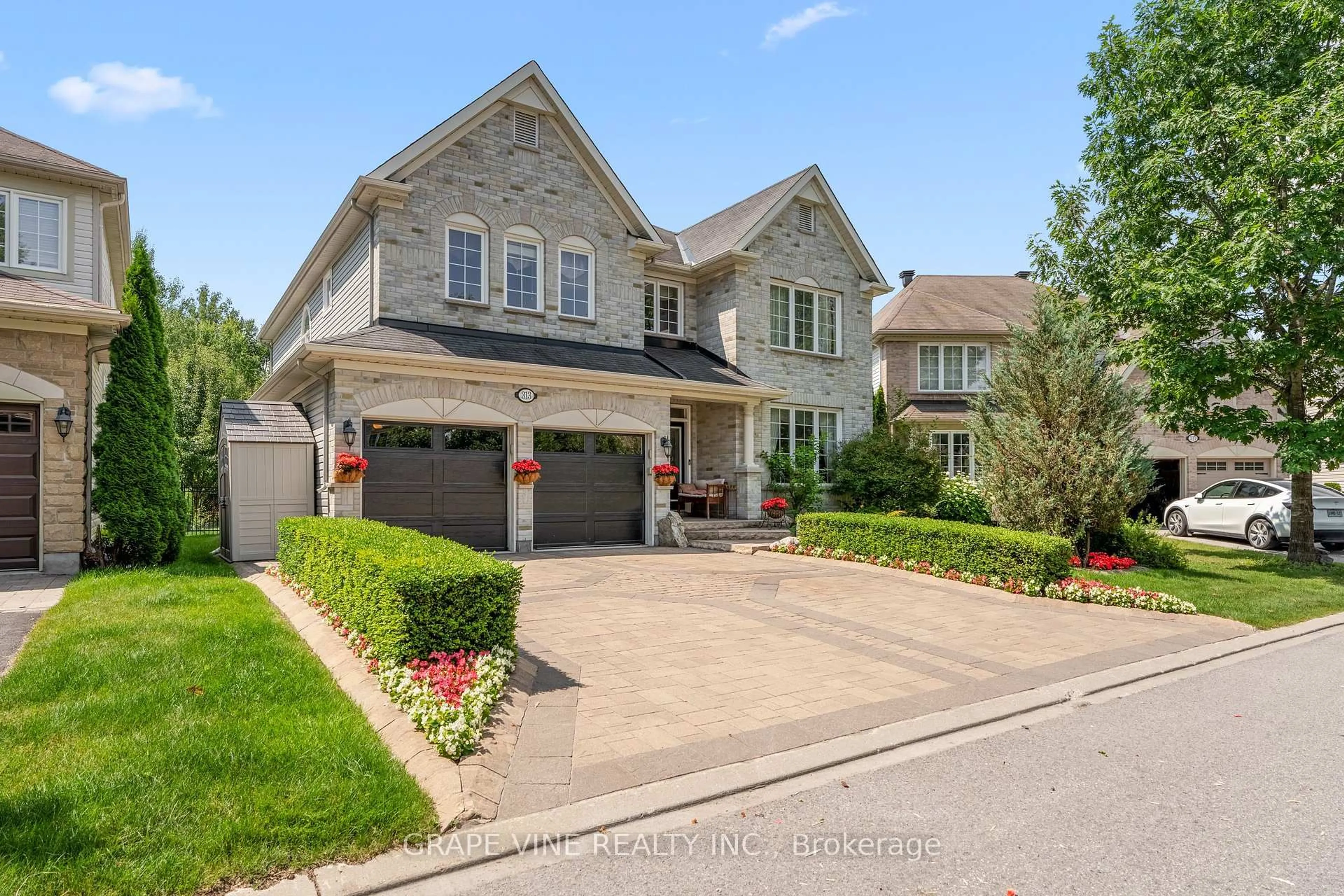 Home with brick exterior material, street for 313 Eckerson Ave, Ottawa Ontario K2S 0K8