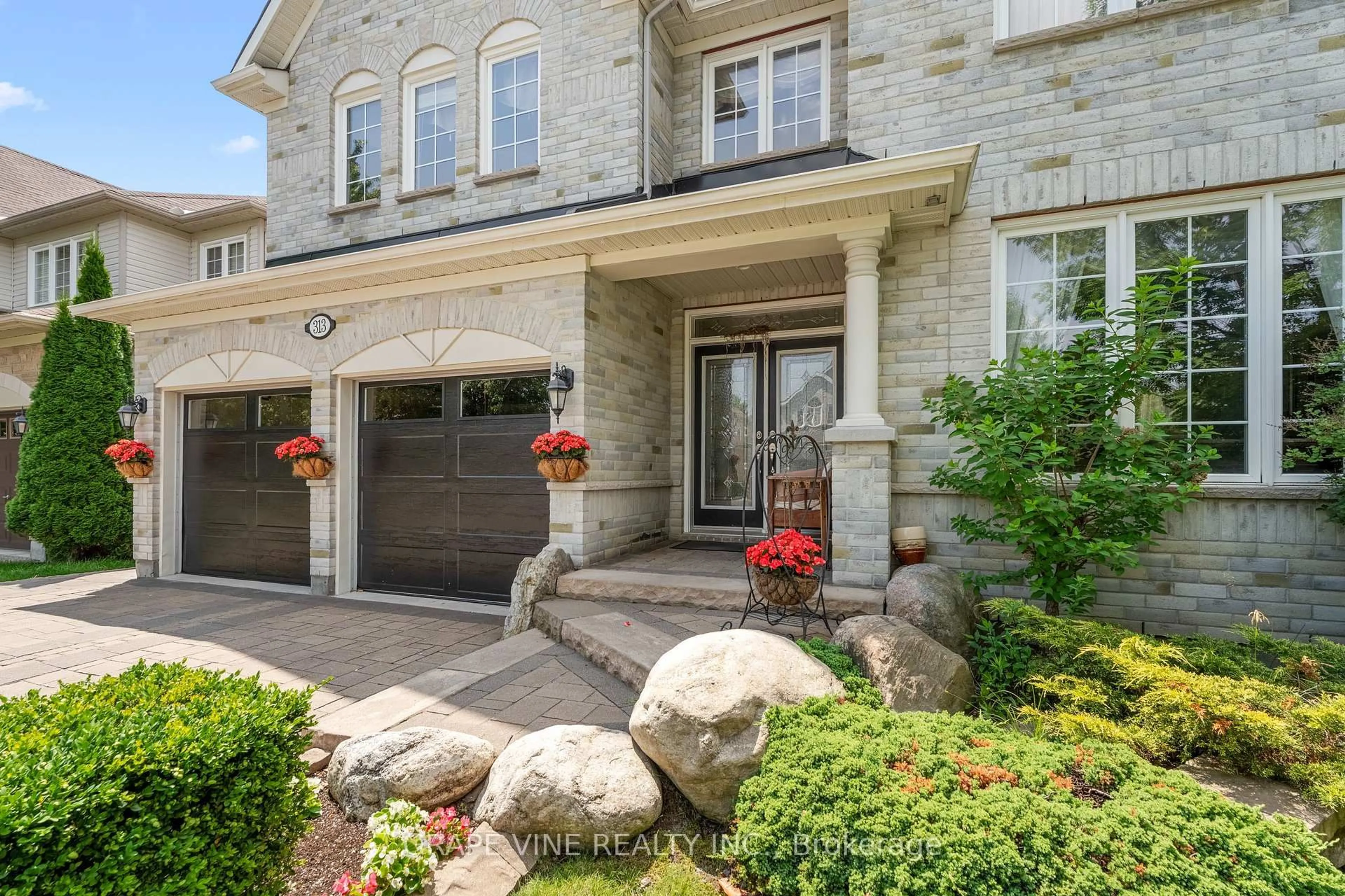 Home with brick exterior material, street for 313 Eckerson Ave, Ottawa Ontario K2S 0K8