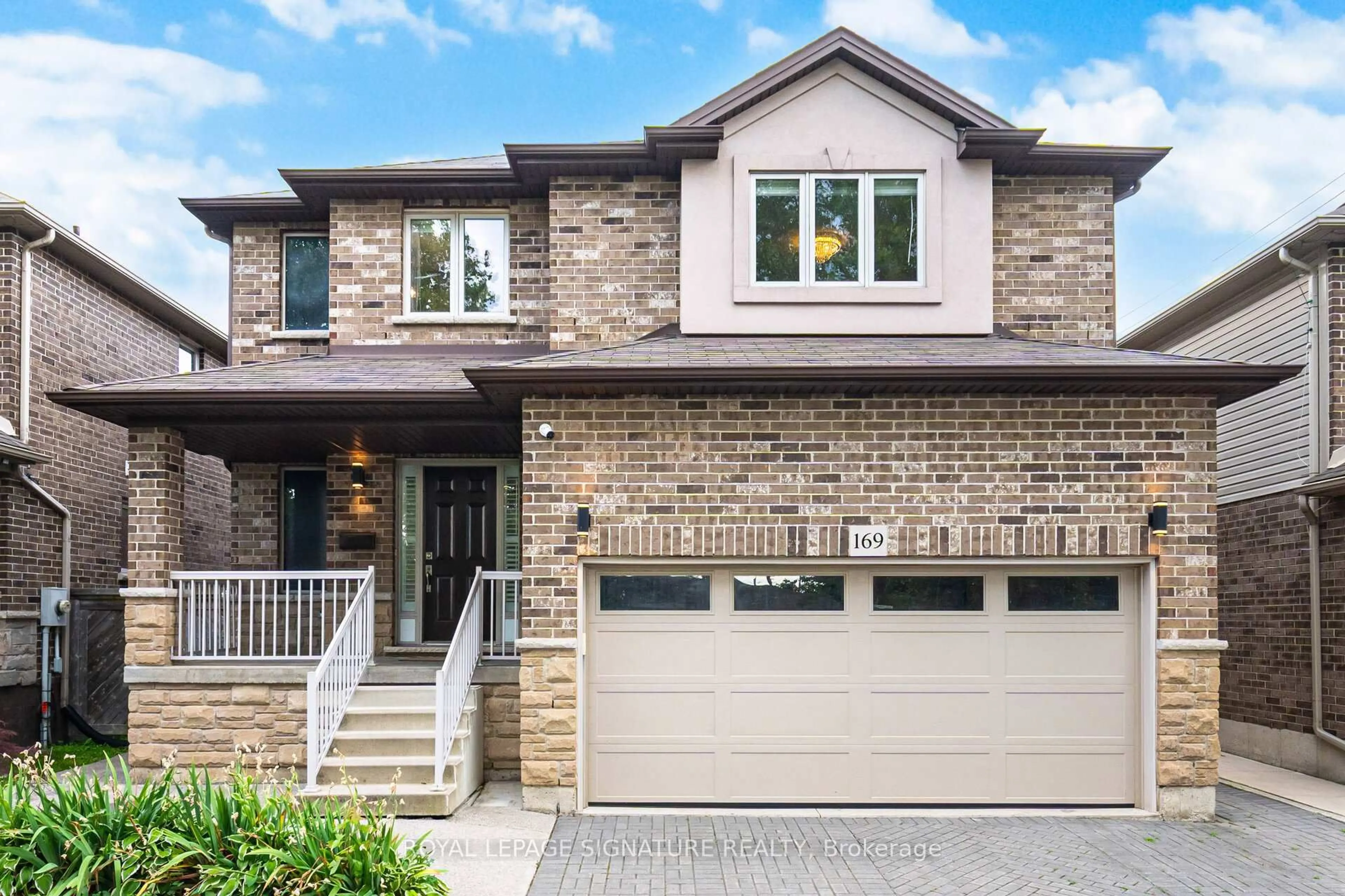 Home with brick exterior material, street for 169 East 8th St, Hamilton Ontario L9A 4Y7