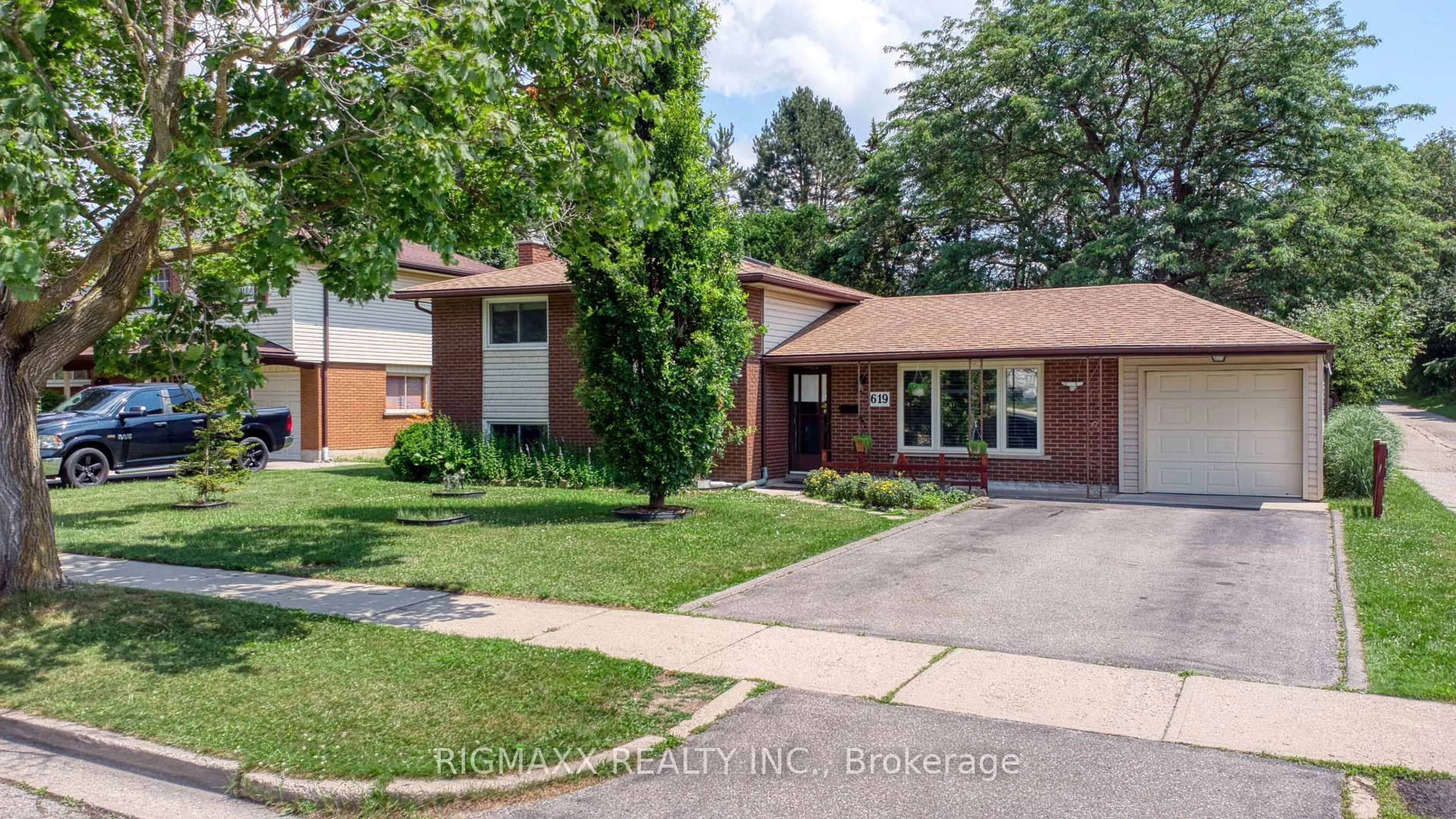 Home with brick exterior material, street for 619 Forest Hill Dr, Kitchener Ontario N2N 1A1
