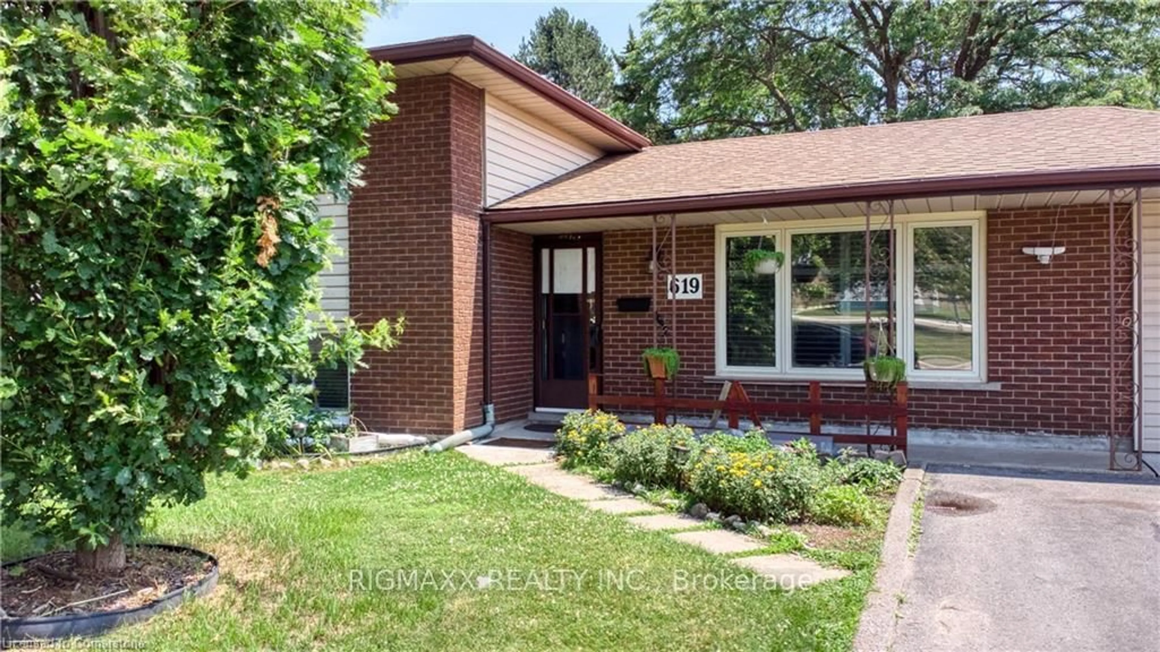 Home with brick exterior material, street for 619 Forest Hill Dr, Kitchener Ontario N2N 1A1