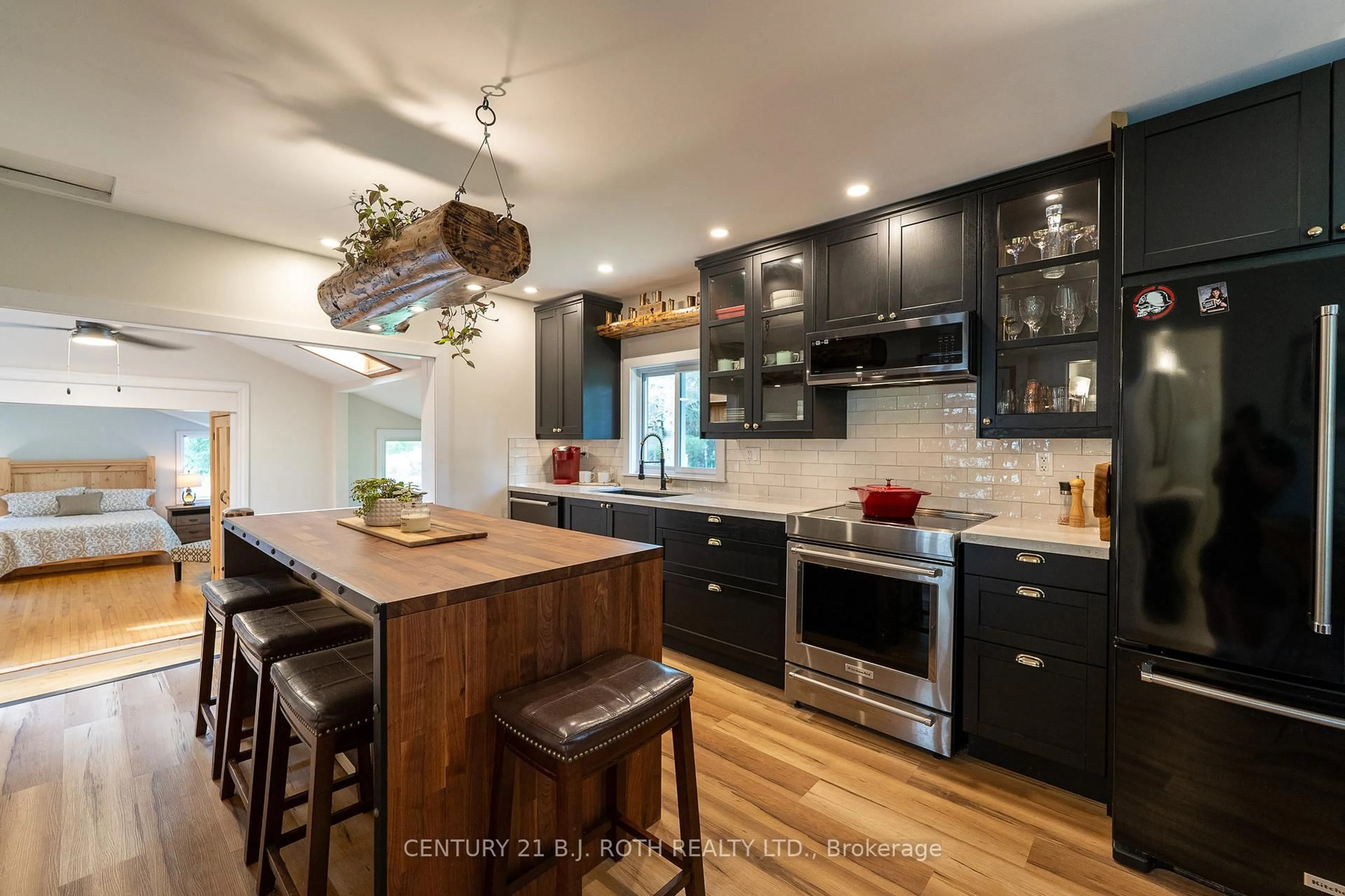 Open concept kitchen, wood/laminate floor for 3 Burke Rd, Kawartha Lakes Ontario K0M 1C0