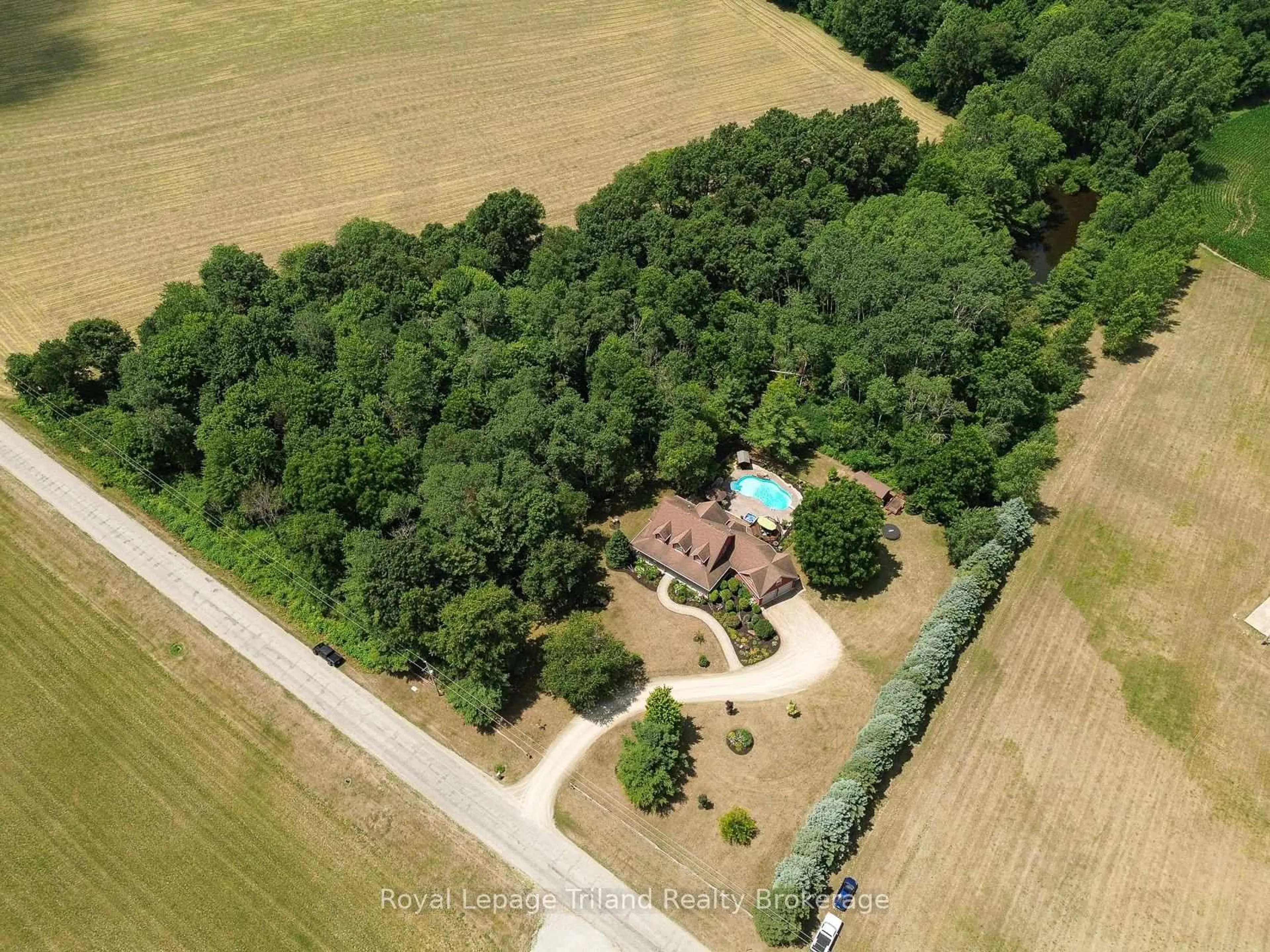 A pic from outside/outdoor area/front of a property/back of a property/a pic from drone, forest/trees view for 537 Plowman's Line, Norfolk Ontario N4G 4G9