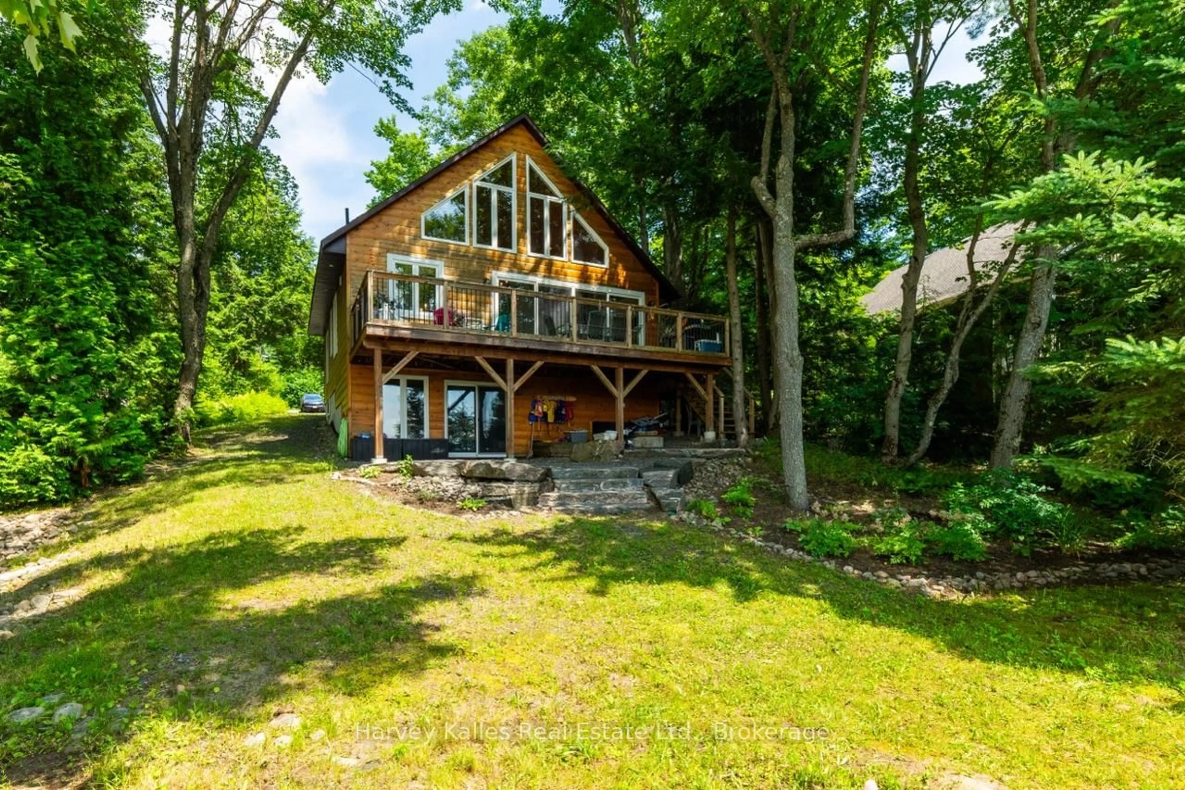 A pic from outside/outdoor area/front of a property/back of a property/a pic from drone, water/lake/river/ocean view for 1082 Mortimers Point Rd, Muskoka Lakes Ontario P0B 1J0