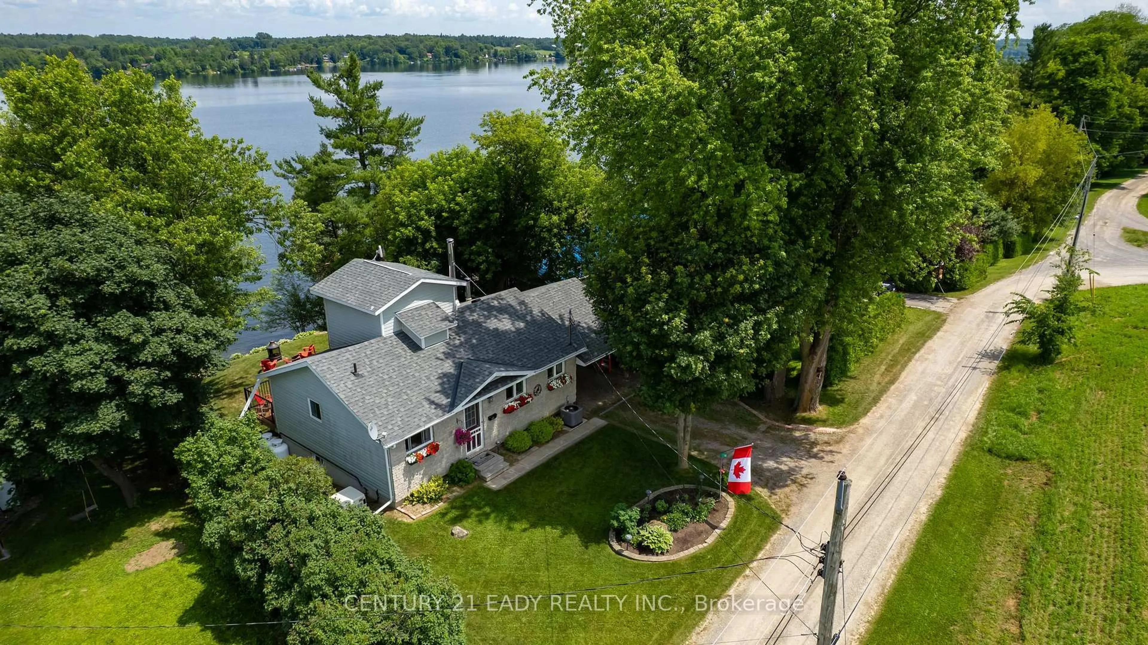 A pic from outside/outdoor area/front of a property/back of a property/a pic from drone, water/lake/river/ocean view for 14 Rossel Tr, Cobden Ontario K0J 1K0