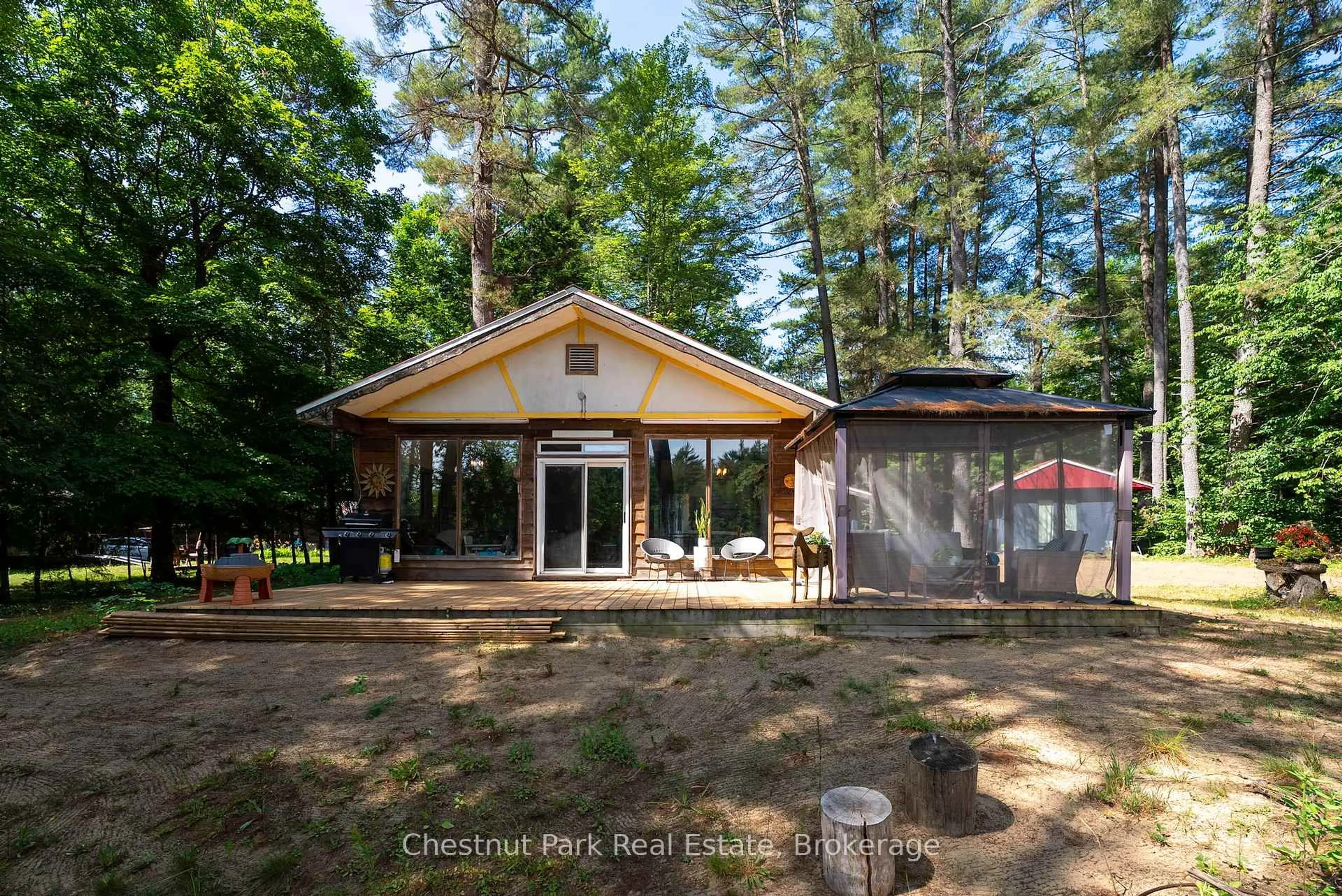 A pic from outside/outdoor area/front of a property/back of a property/a pic from drone, forest/trees view for 1277 Sherwood Forest Rd, Bracebridge Ontario P1L 1X3