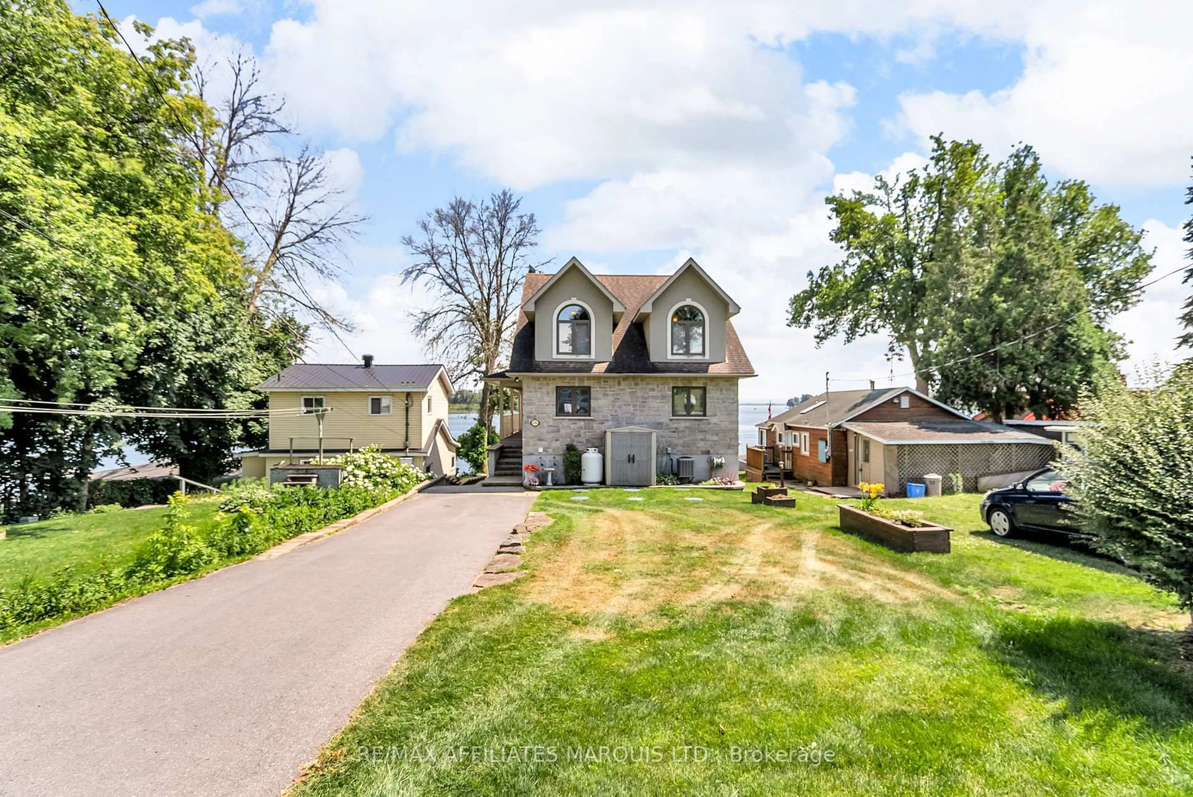 A pic from outside/outdoor area/front of a property/back of a property/a pic from drone, street for 6796 St Louis Point Rd, South Glengarry Ontario K0C 2E0