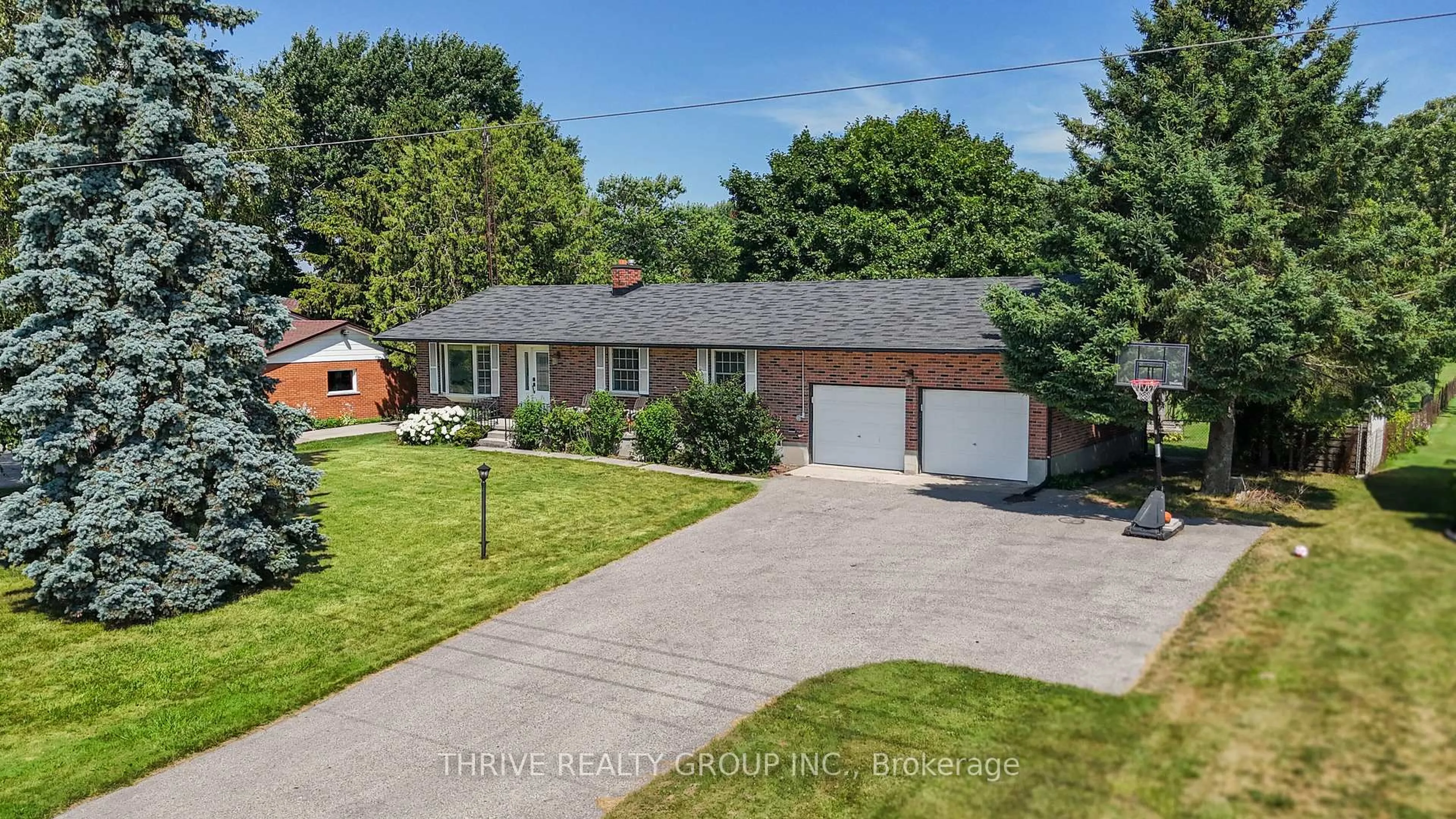A pic from outside/outdoor area/front of a property/back of a property/a pic from drone, street for 15322 Medway Rd, Middlesex Centre Ontario N0M 1C0
