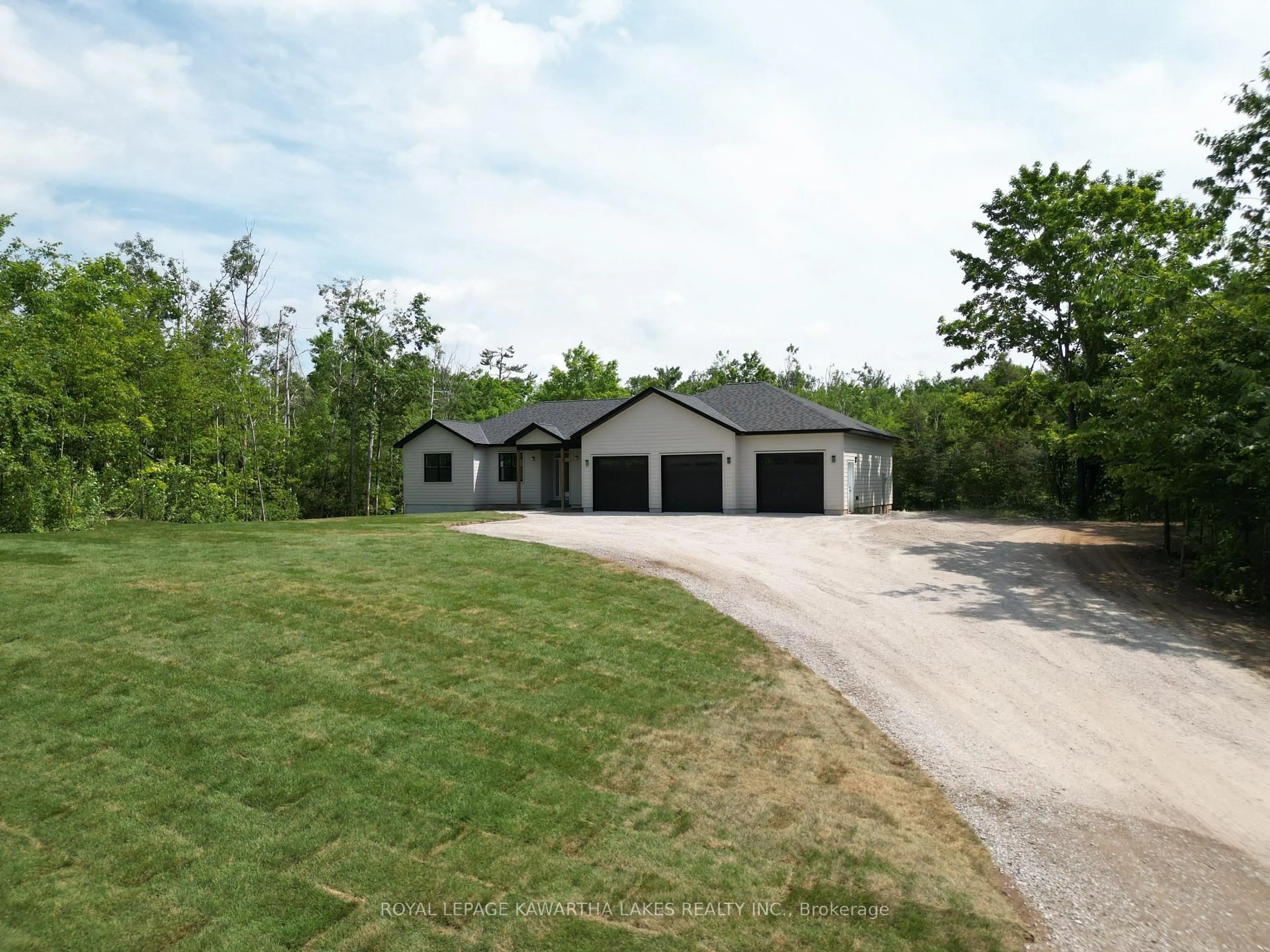 A pic from outside/outdoor area/front of a property/back of a property/a pic from drone, street for 104 Moon Line Rd, Kawartha Lakes Ontario K0M 1A0