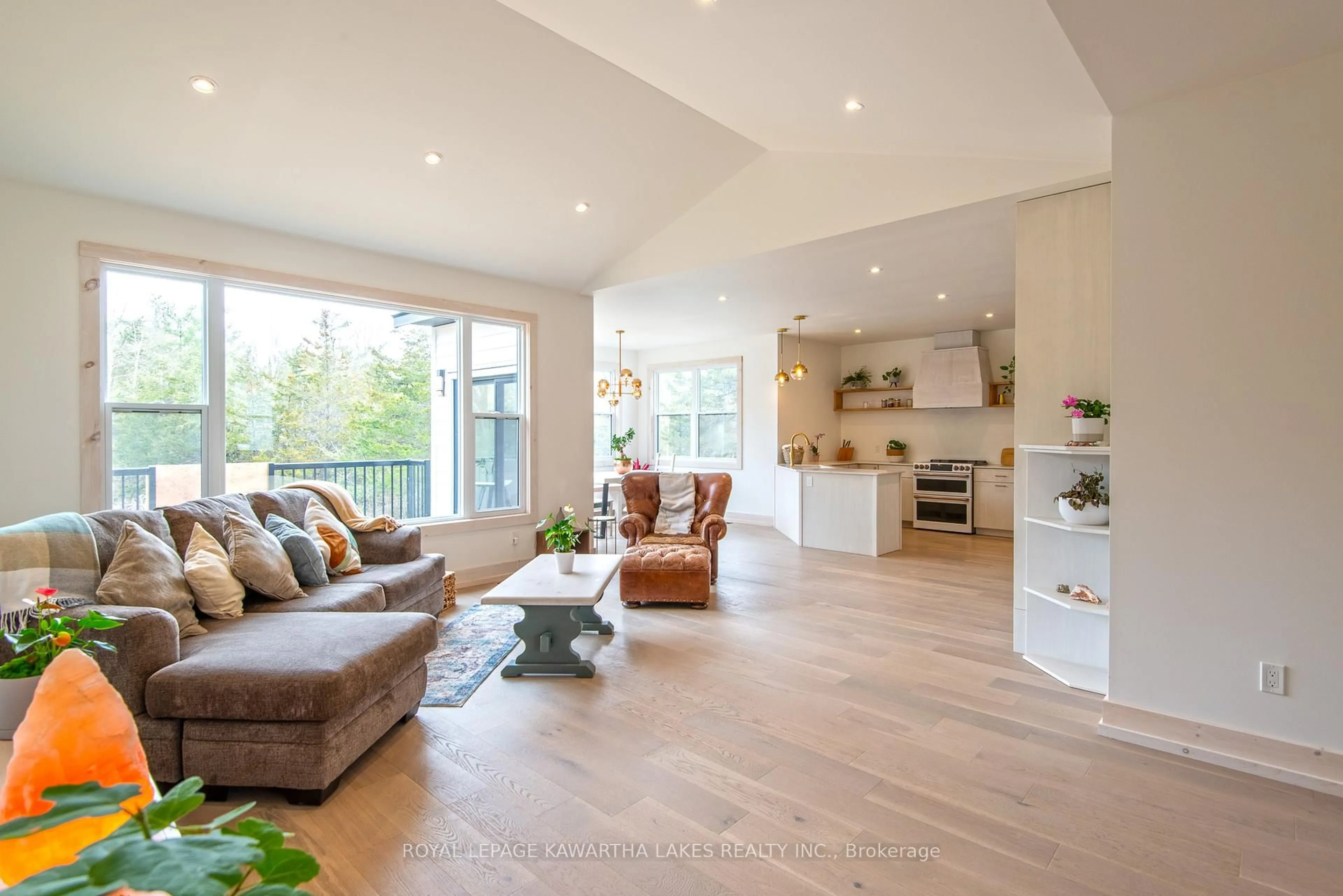 Living room with furniture, wood/laminate floor for 104 Moon Line Rd, Kawartha Lakes Ontario K0M 1A0