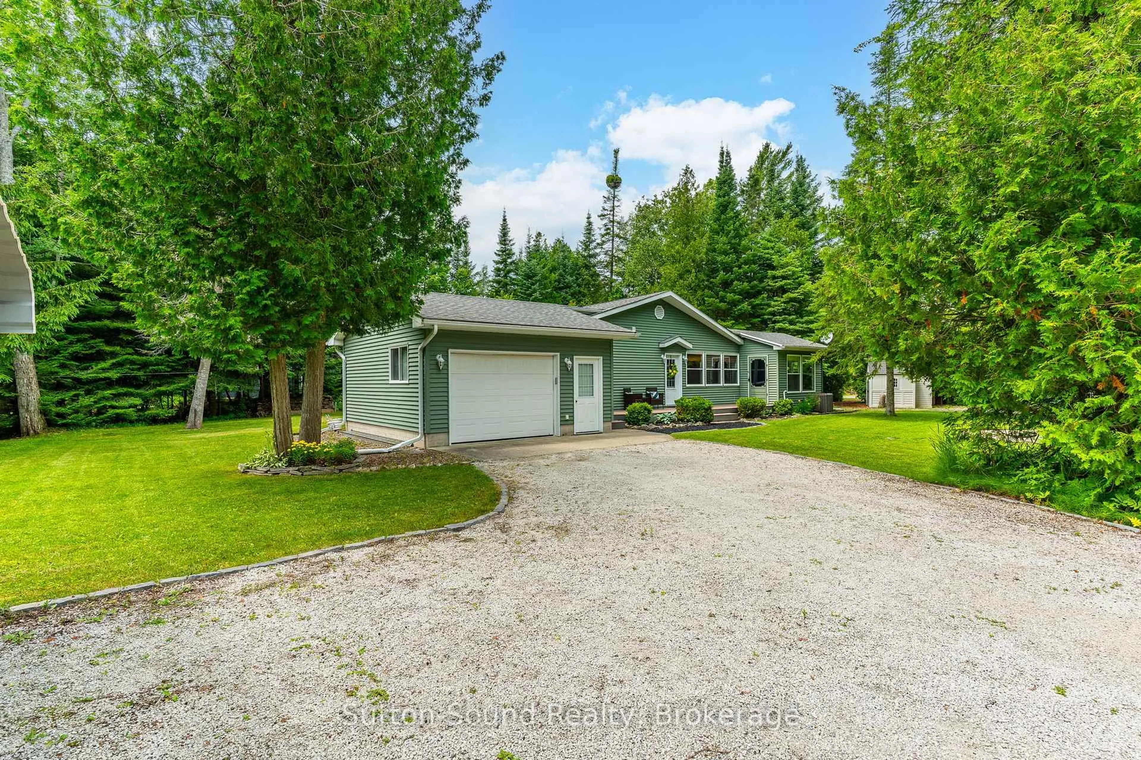 A pic from outside/outdoor area/front of a property/back of a property/a pic from drone, street for 749 Oxford Cres, South Bruce Peninsula Ontario N0H 2G0