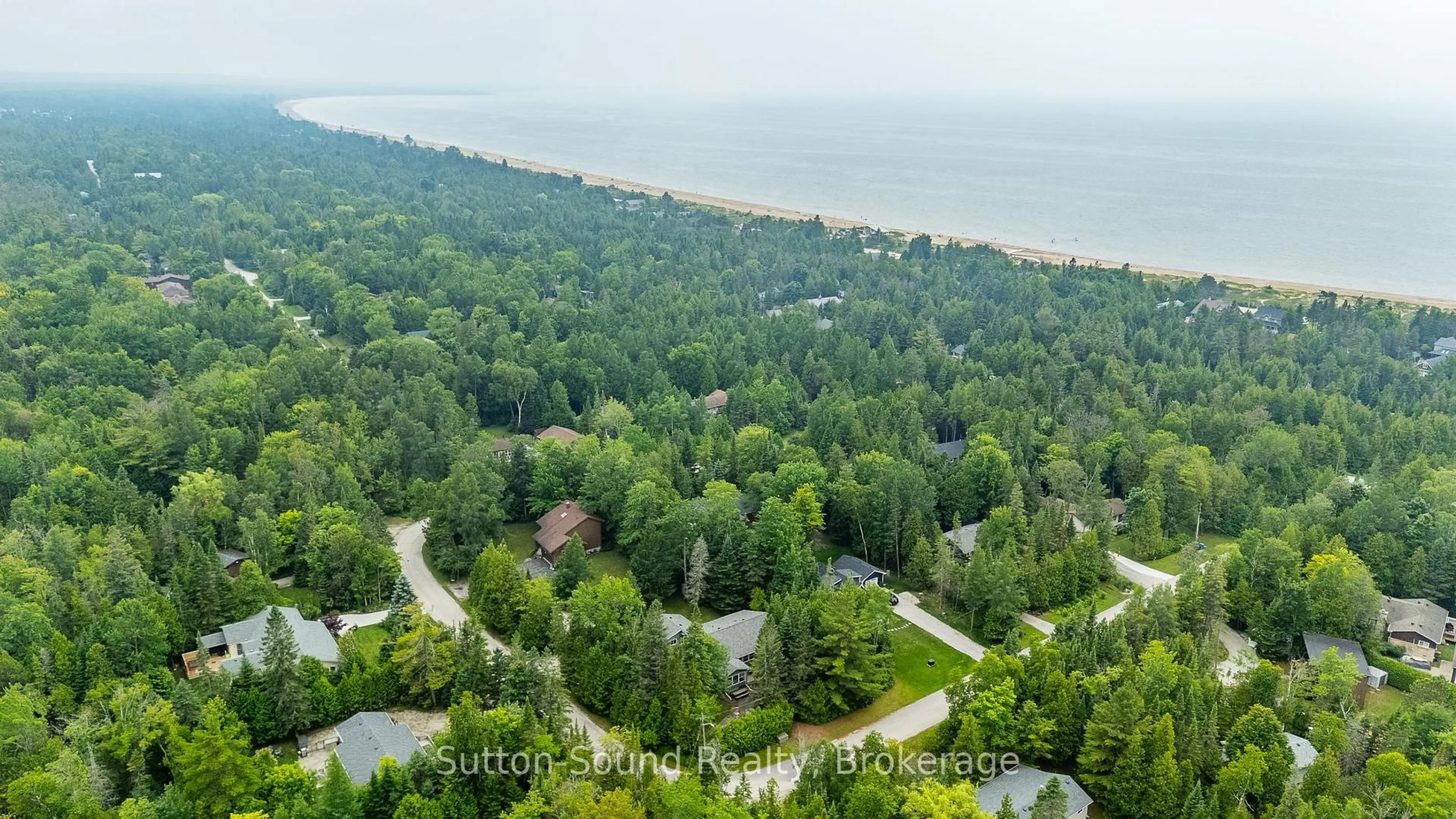 A pic from outside/outdoor area/front of a property/back of a property/a pic from drone, forest/trees view for 749 Oxford Cres, South Bruce Peninsula Ontario N0H 2G0