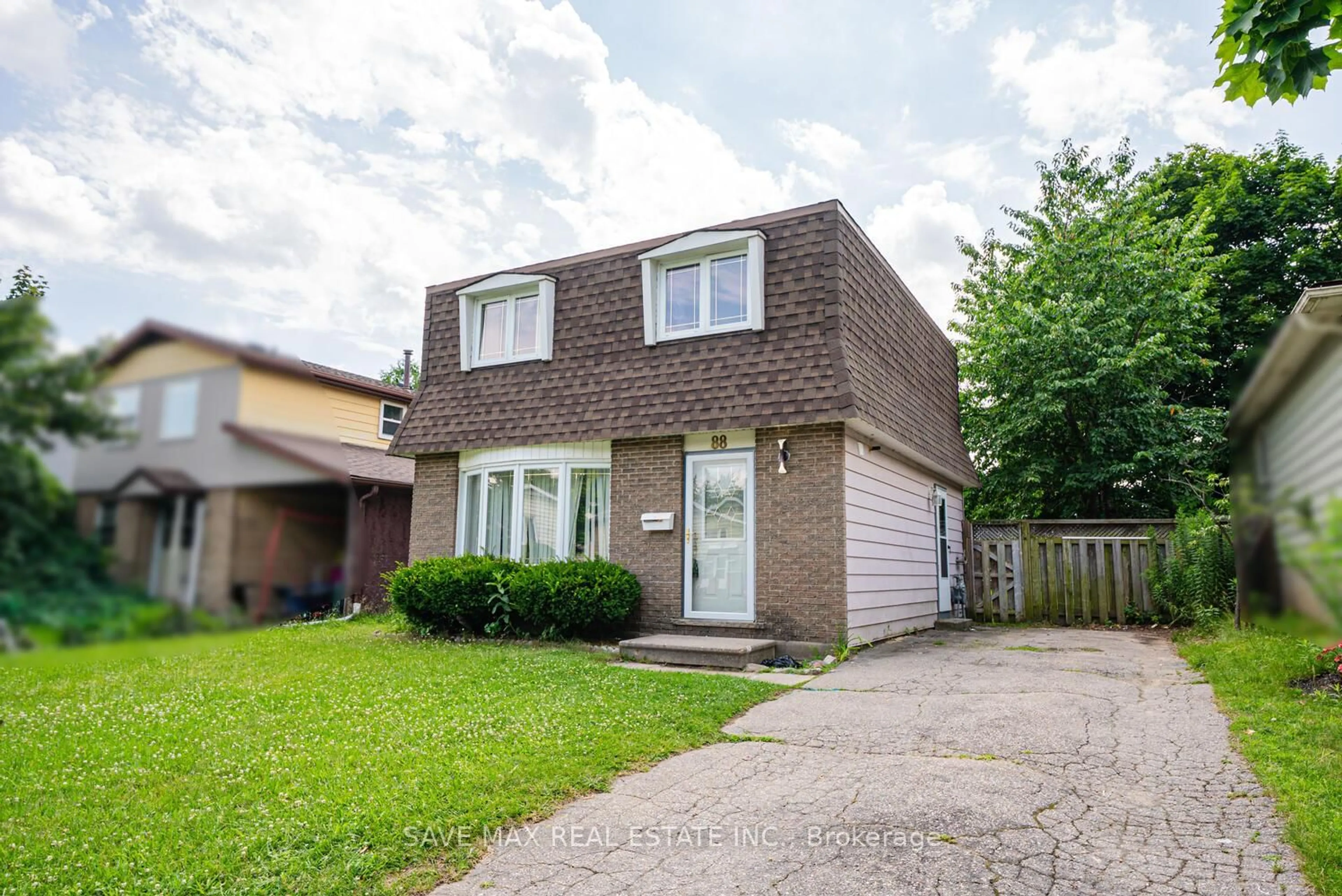 Home with brick exterior material, street for 88 Harcourt Cres, Kitchener Ontario N2P 1K9